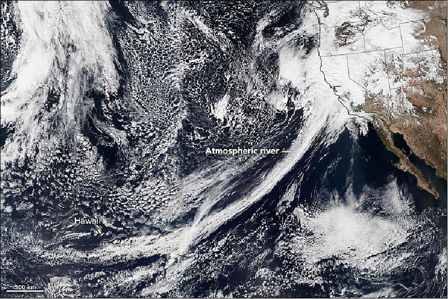Figure 62: VIIRS on Suomi NPP captured a natural-color image of conditions over the northeastern Pacific. Note the tight arc of clouds stretching from Hawaii to California, a visible manifestation of the atmospheric river pouring moisture into western states (image credit: NASA Earth Observatory, images by Jesse Allen and Joshua Stevens using VIIRS data)