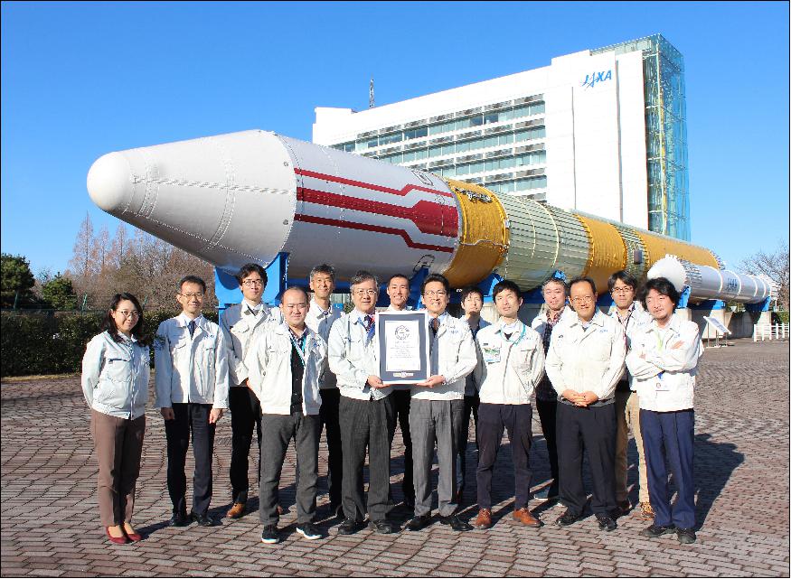 Figure 19: Photo of the proud TSUBAME Team who received the Guinness World Record for their efforts.Tsubame successfully completed its orbital maintaining operation using ion engine technology at all the seven altitudes as follows: 271.5 km and 216.8 km each for 38 days, 250 km, 240 km, 230 km, 181.1 km, and 167.4 km each for 7 days (at 167.4 km altitude, Tsubame used both its ion engine system and RCS because of the large atmospheric drag), image credit: JAXA