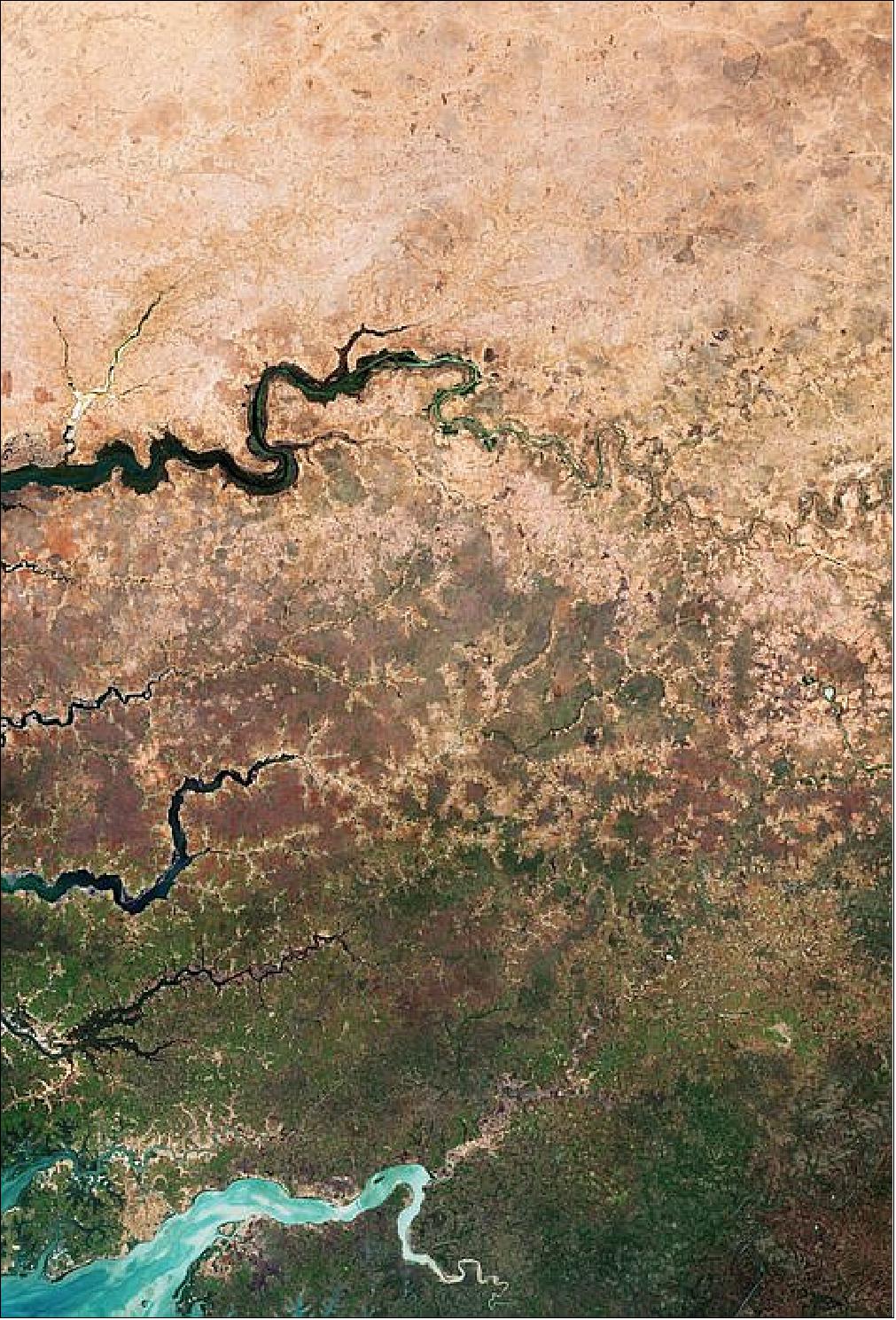 Figure 26: Captured by the Copernicus Sentinel-2 mission in 2019, this image shows the edge of the dry desert in west Africa contrasted with vegetated land. Signs of land degradation can be seen as brighter “islands” around villages and to a lesser extent along roads and rivers showing bare soil and degraded vegetation. The image shows parts of three African countries: Senegal, The Gambia and Guinea-Bissau (image credit: ESA, the image contains modified Copernicus Sentinel data (2019), processed by ESA, CC BY-SA 3.0 IGO)