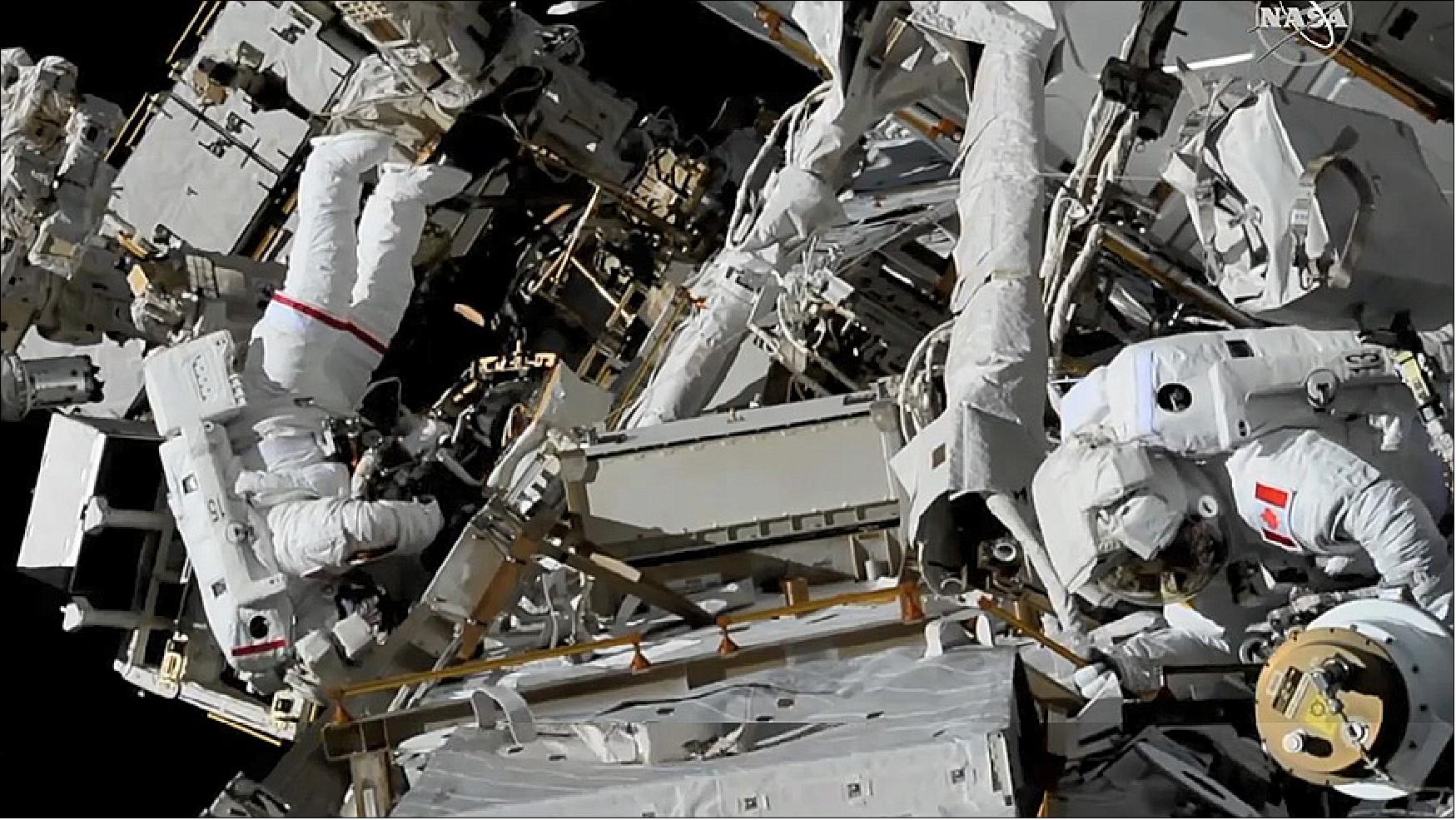 Figure 97: Astronauts Anne McClain (left) and David Saint-Jacques work outside the International Space Station during their spacewalk on April 8, 2019 (image credit: NASA)