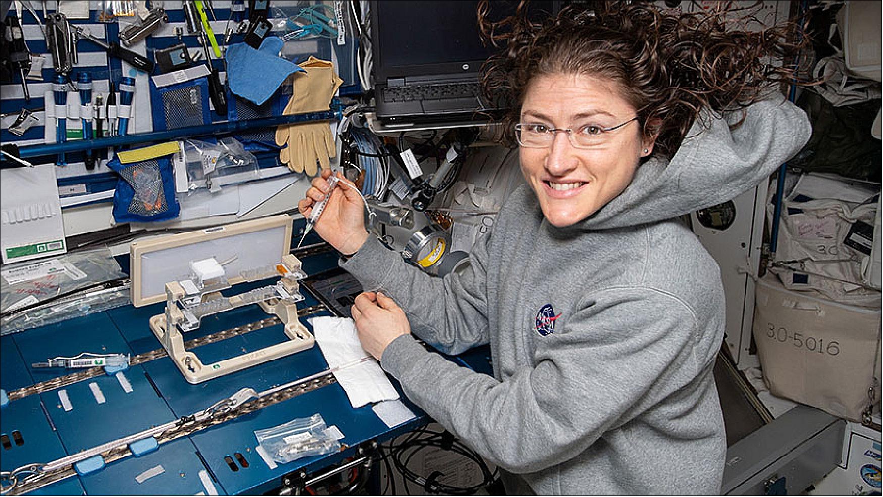Figure 80: NASA astronaut Christina Koch works on the Capillary Structures experiment studying how to manage fluid and gas mixtures for more reliable life support systems in space (image credit: NASA)