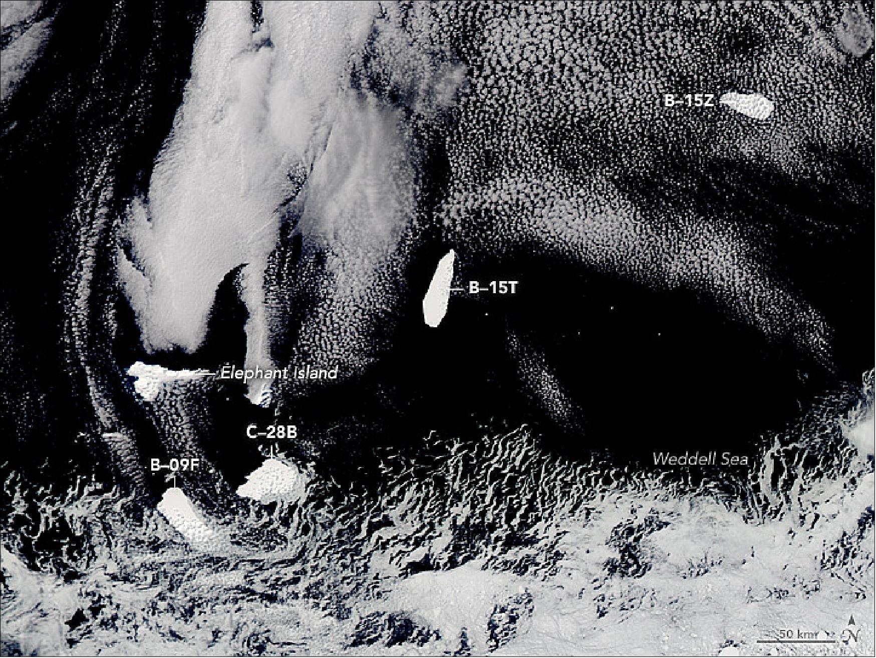 Figure 49: By late 2017, the Weddell Sea gyre had redirected B-15T from its near circumnavigation and sent the berg drifting north. This third image was acquired in October 2017 by MODIS on NASA’s Aqua satellite. It shows the iceberg when it was near Elephant Island, an icy bit of rock located a few hundred kilometers north-northeast from the tip of the Antarctic Peninsula (image credit: NASA Earth Observatory)