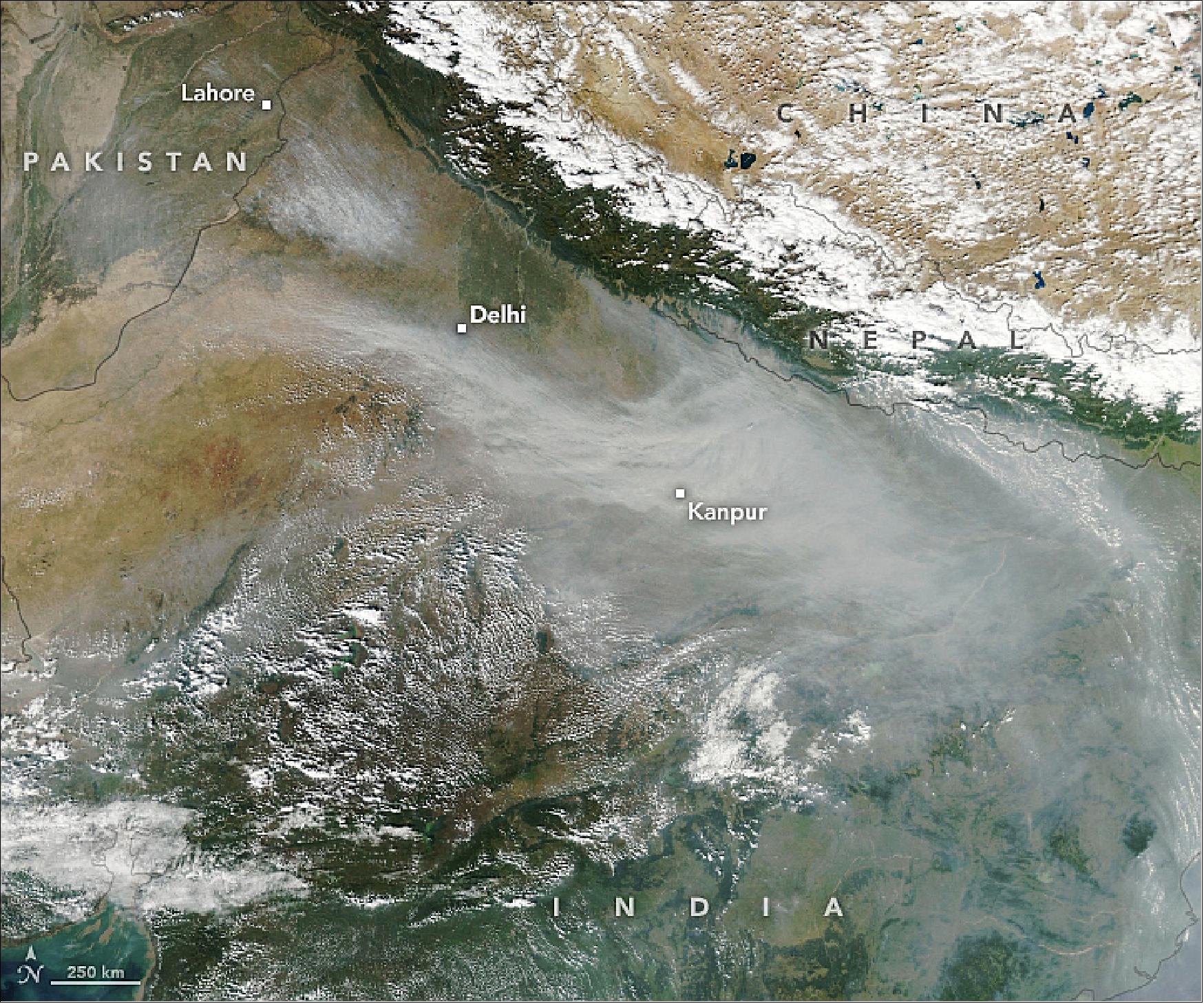 Figure 2: In 2019, NASA Earth-observing satellites began to detect significant numbers of fires in mid October. By the end of the month, large numbers of fires were detected across much of the state of Punjab, as well as parts of northeastern Pakistan. MODIS on NASA’s Aqua satellite captured this natural-color image on the afternoon of November 4, 2019, when a plume of smoke that had been emitted a few days earlier was sweeping through Delhi and Kanpur. The haze had pushed levels of fine particulate matter (PM2.5) to hazardous levels in Delhi, according to data collected at the U.S. Embassy (image credit: NASA Earth Observatory, image by Lauren Dauphin, using MODIS data from NASA EOSDIS/LANCE and GIBS/Worldview, story by Adam Voiland)