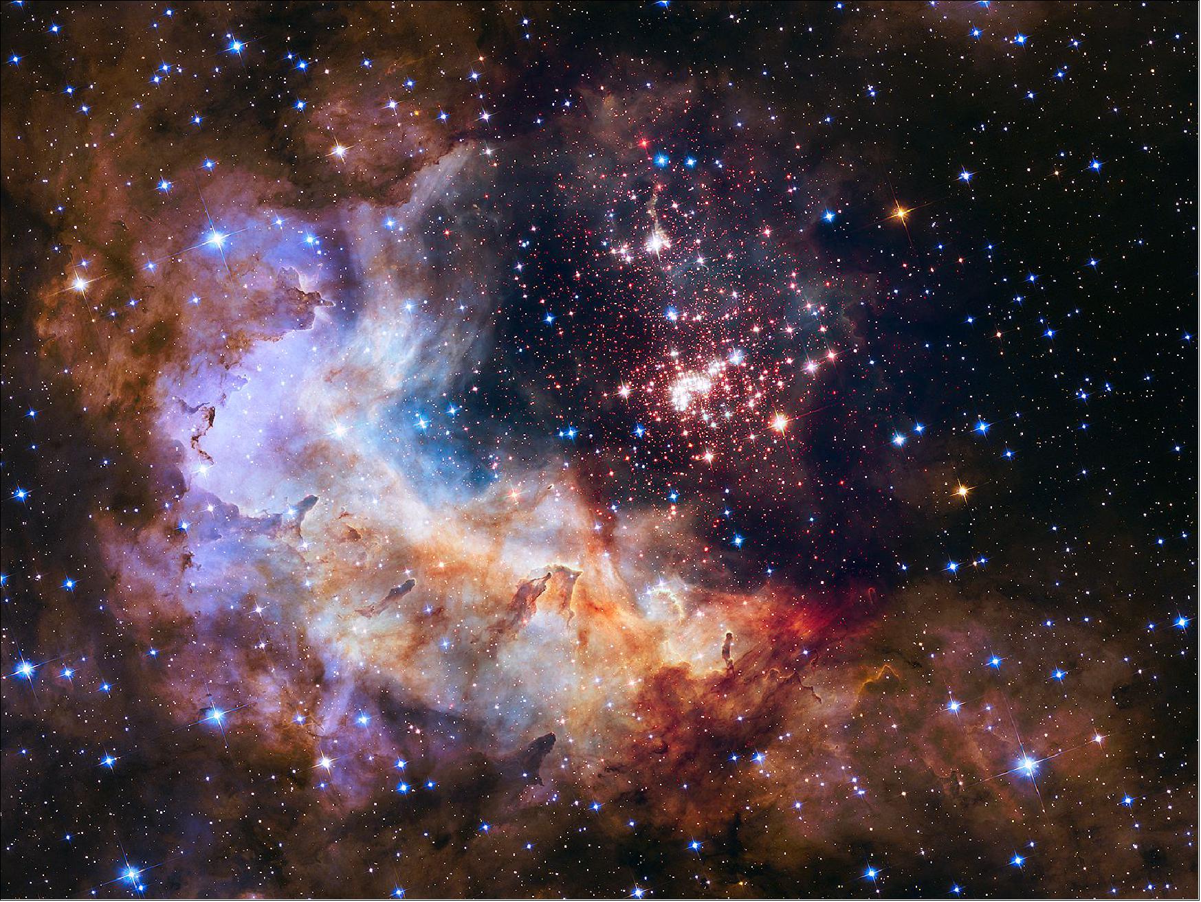 Figure 49: NASA unveils Celestial Fireworks as Official Image for Hubble's 25th Anniversary on April 24, 2015. The image was acquired with WFC-3 (Wide Field Camera-3) piercing through the dusty veil shrouding the stellar nursery in near-infrared light, giving astronomers a clear view of the nebula and the dense concentration of stars in the central cluster. (image credit: NASA, ESA, STScI) 69) 70) 71)