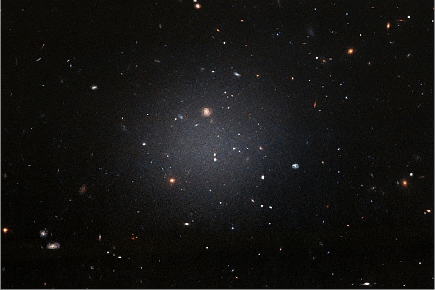 Figure 44: A ghostly galaxy lacking dark matter (image credit: NASA, ESA, and P. van Dokkum (Yale University))