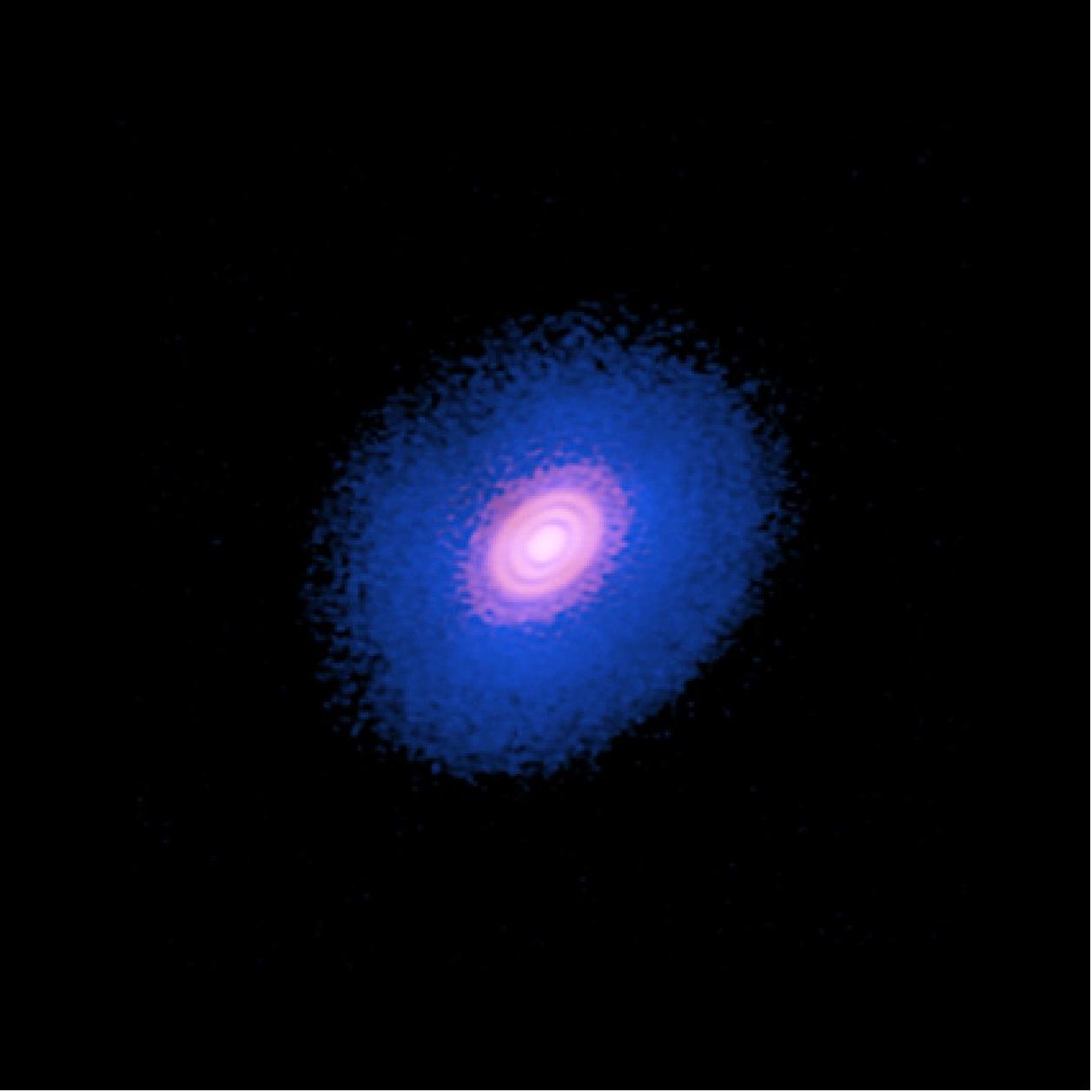 Figure 44: Composite image of the protoplanetary disk surrounding the young star HD 163296. The inner red area shows the dust of the protoplanetary disk. The broader blue disk is the carbon monoxide gas in the system. ALMA observed that in the outer two gaps in the dust, there was a significant dip in the concentration of carbon monoxide, suggesting two planets are forming there [image credit: ALMA (ESO/NAOJ/NRAO); A. Isella; B. Saxton (NRAO/AUI/NSF)]