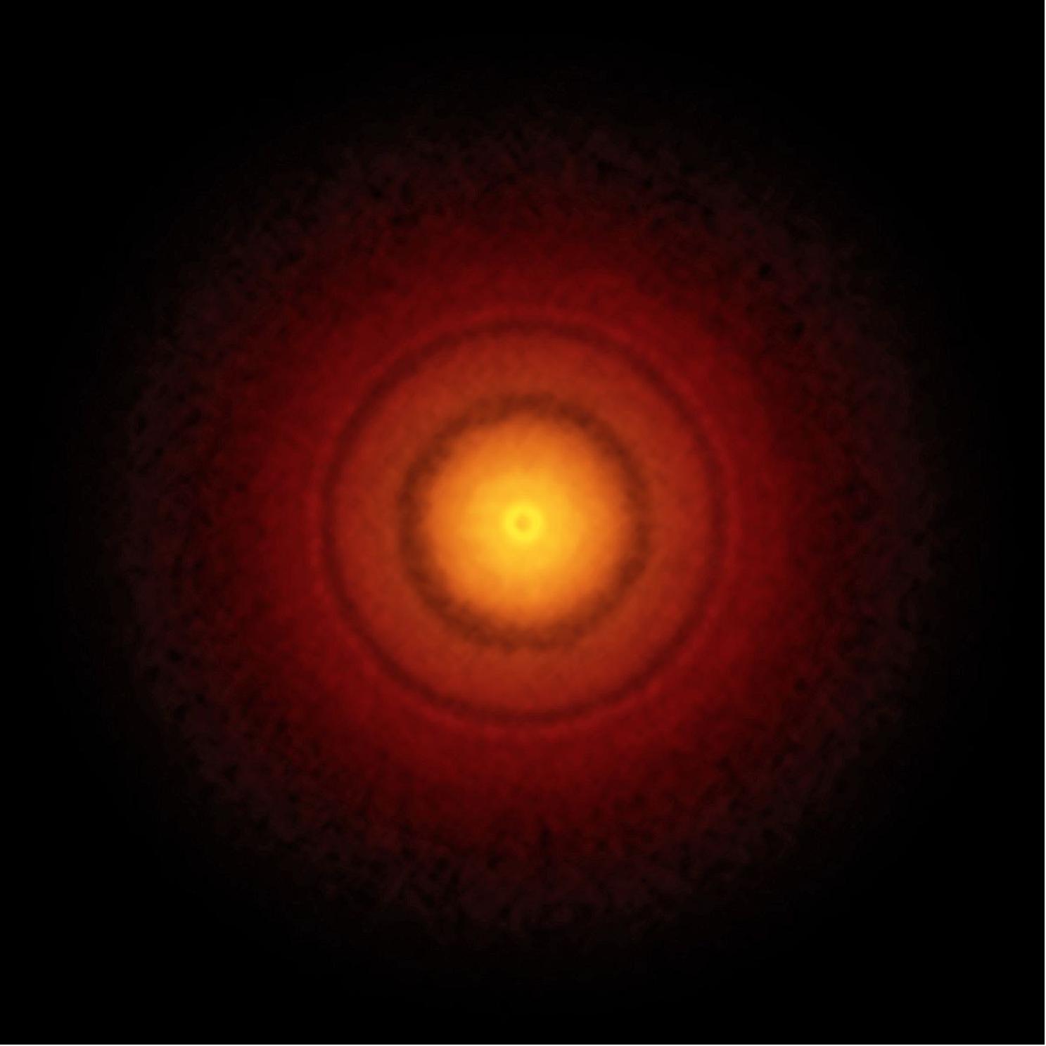 Figure 52: ALMA's best image of a protoplanetary disc to date. This picture of the nearby young star TW Hydrae reveals the classic rings and gaps that signify planets are in formation in this system [image credit: S. Andrews (Harvard-Smithsonian CfA); B. Saxton (NRAO/AUI/NSF); ALMA (ESO/NAOJ/NRAO)]