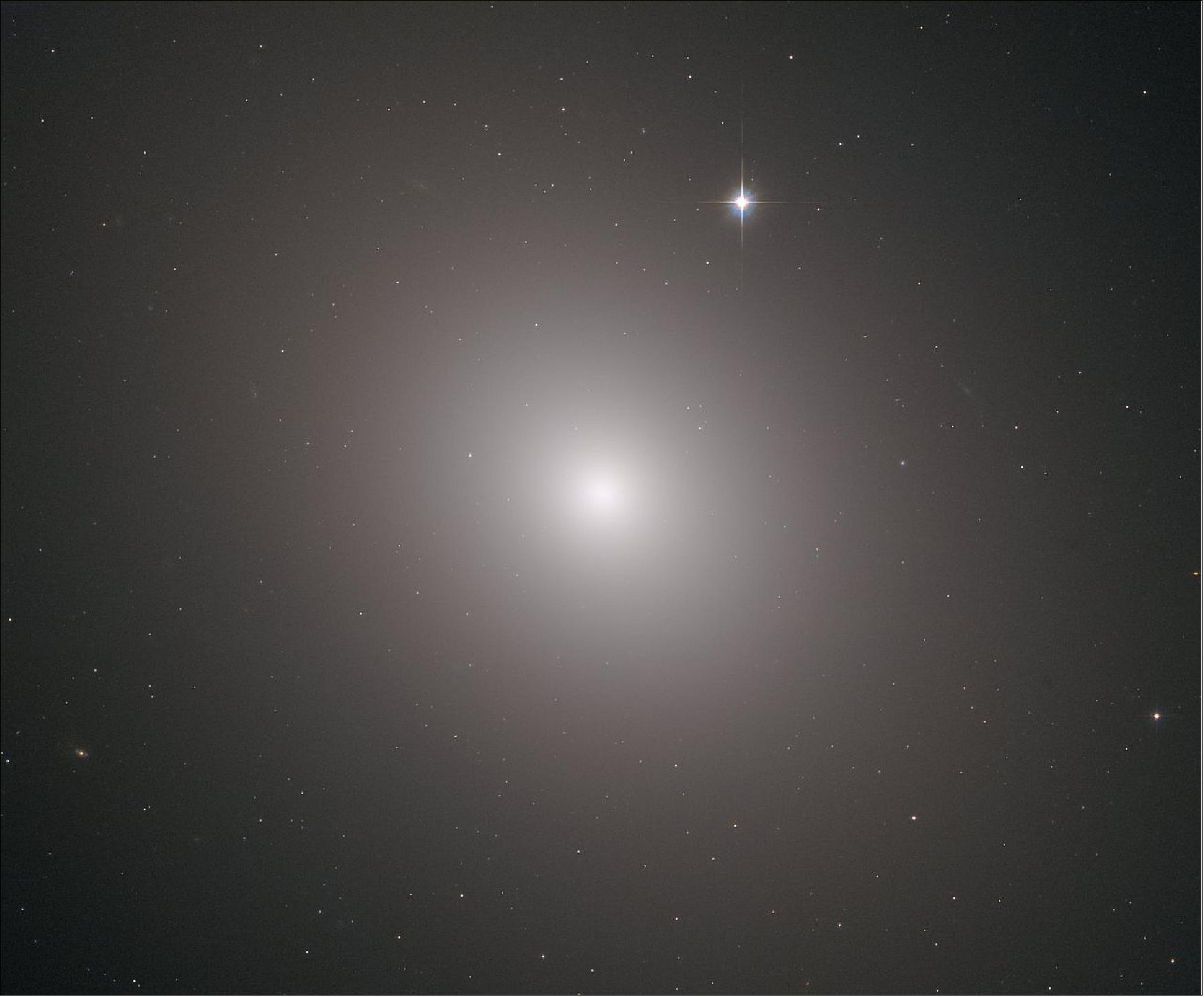 Figure 65: Invisible X-rays of Messier 49 (image credit: ESA/Hubble & NASA, J. Blakenslee, P Cote et al.)