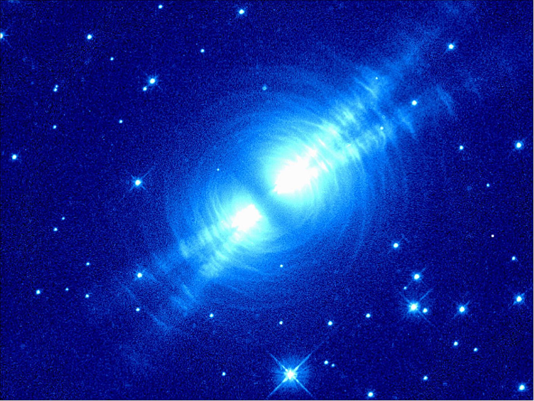 Figure 60: The Egg Nebula is a 'preplanetary nebula'. These objects occur as a dying star's hot remains briefly illuminates material it has expelled, lighting up the gas and dust that surrounds it. This image is based on observations performed in the mid 1990s in red light with the Wide Field and Planetary Camera 2 (WFPC2) on the NASA/ESA Hubble Space Telescope (image credit: Raghvendra Sahai and John Trauger (JPL), the WFPC2 science team, and NASA/ESA)