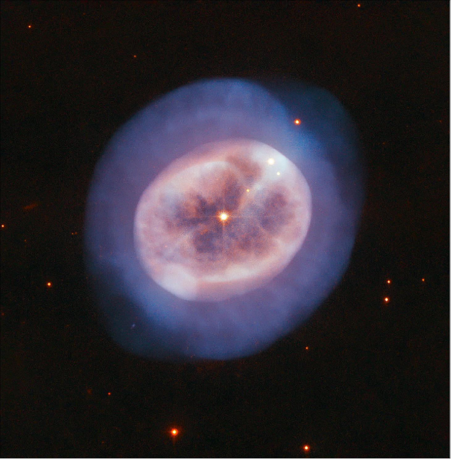 Figure 31: Although it looks more like an entity seen through a microscope than a telescope, this rounded object, named NGC 2022, is certainly no alga or tiny, blobby jellyfish. Instead, it is a vast orb of gas in space, cast off by an ageing star. The star is visible in the orb's center, shining through the gases it formerly held onto for most of its stellar life (image credit: ESA/Hubble & NASA, R. Wade; CC BY 4.0)