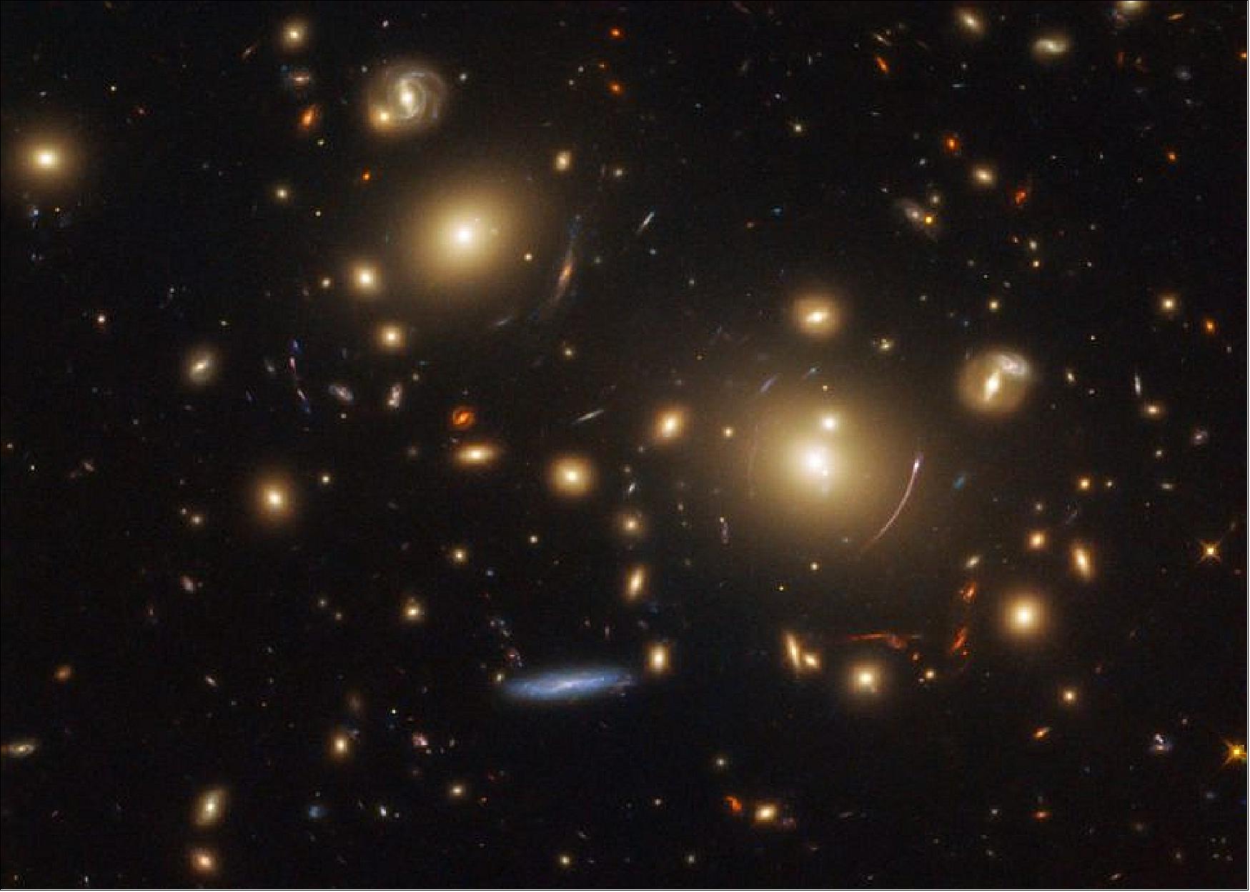 Figure 78: This picture showcases a gravitational lensing system called SDSS J0928+2031. Quite a few images of this type of lensing have been featured as Pictures of the Week in past months, as NASA/ESA Hubble Space Telescope data is currently being used to research how stars form and evolve in distant galaxies (image credit: ESA/Hubble & NASA, M. Gladders et al.)