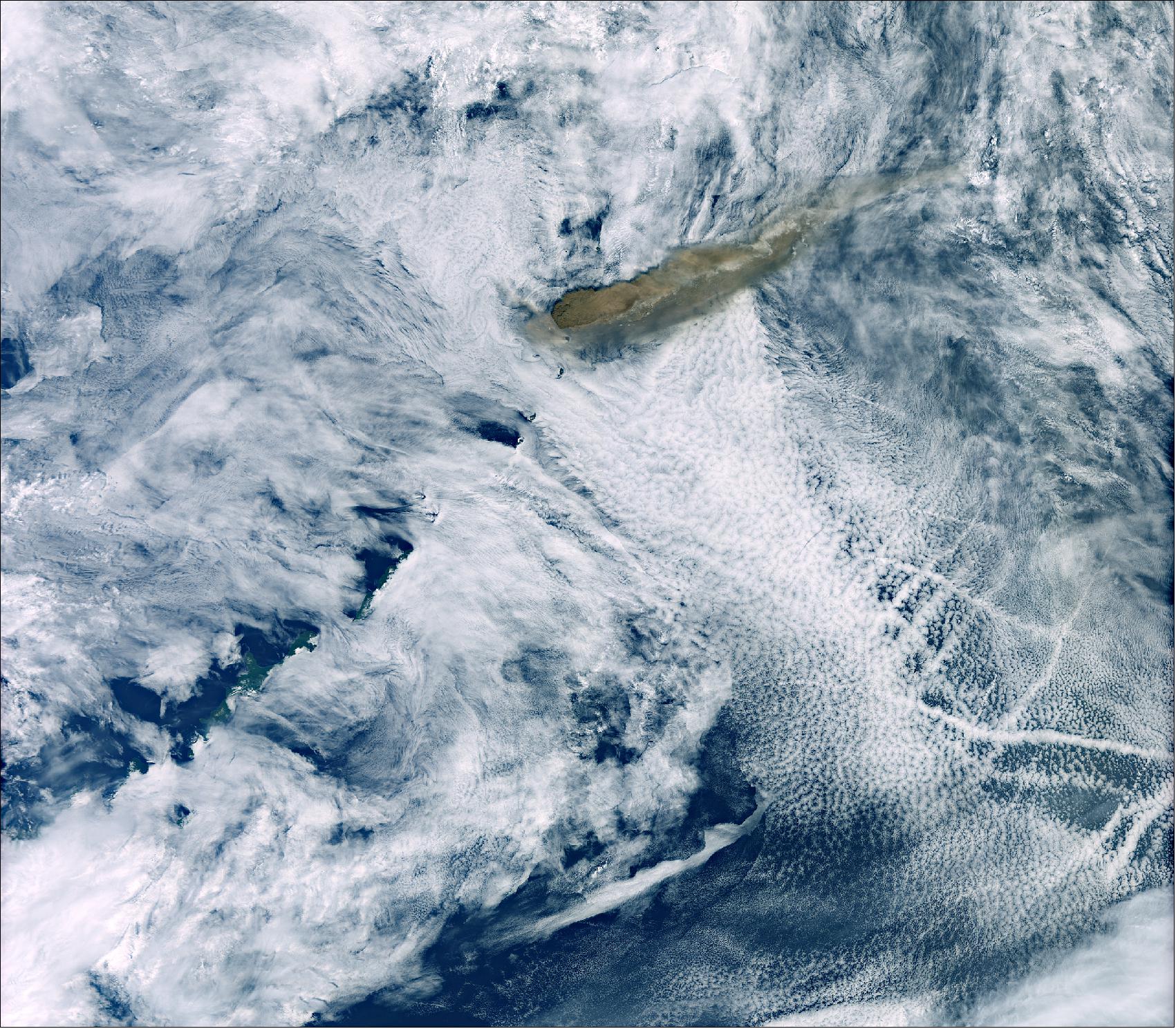 Figure 14: This image, which was captured on 22 June, shows the brown ash plumes rising high above the dense clouds – drifting eastwards over the North Pacific Ocean (image credit: ESA, the image contains modified Copernicus Sentinel data (2019), processed by ESA, CC BY-SA 3.0 IGO)