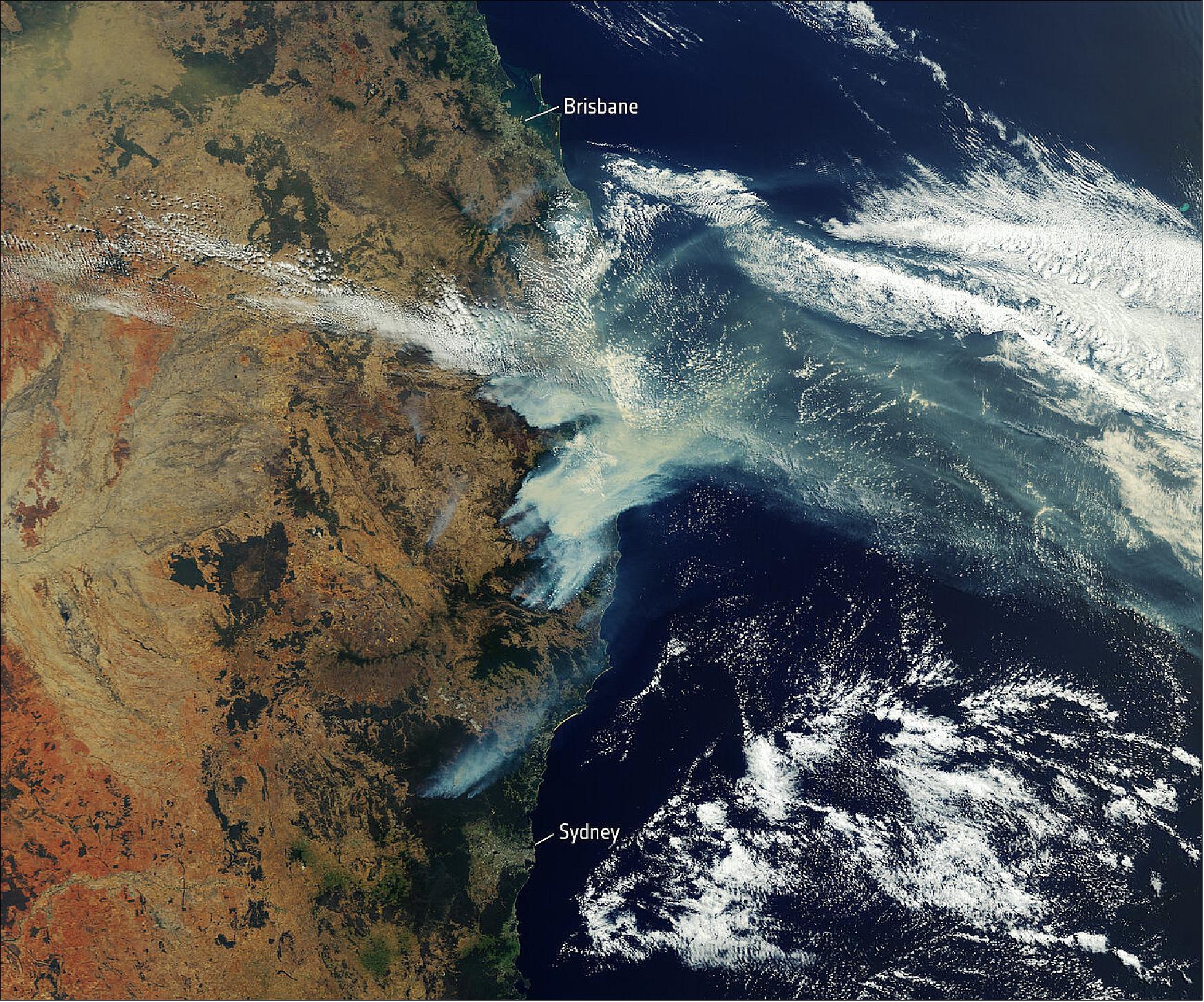 Figure 1: In this image, captured on 12 November 2019 at 23:15 UTC (13 November 09:15 local time), the fires burning near the coast are visible. Plumes of smoke can be seen drifting east over the Tasman Sea. Hazardous air quality owing to the smoke haze has reached the cities of Sydney and Brisbane and is affecting residents, the Australian Environmental Department has warned (image credit: ESA, the image contains modified Copernicus Sentinel data (2019), processed by ESA, CC BY-SA 3.0 IGO)