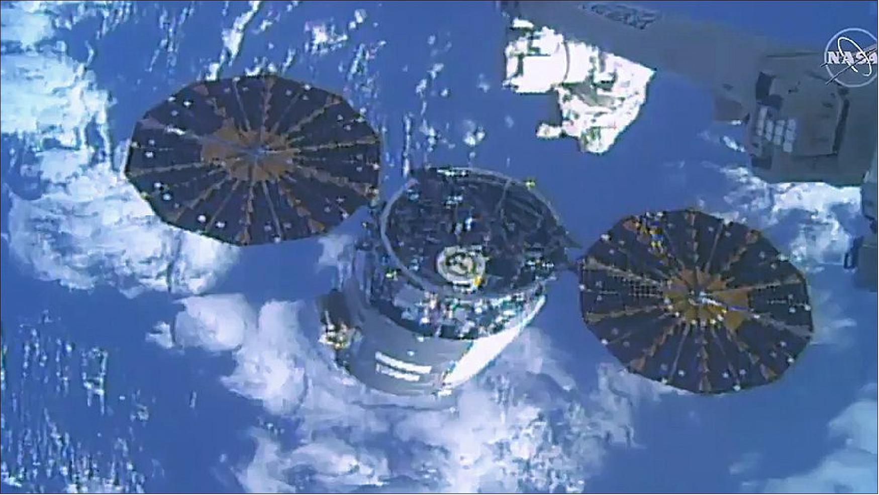 Figure 5: In this frame from NASA TV, the U.S. Cygnus space freighter from Northrop Grumman is pictured moments after being released from the space station’s Canadarm2 robotic arm (image credit: NASA)