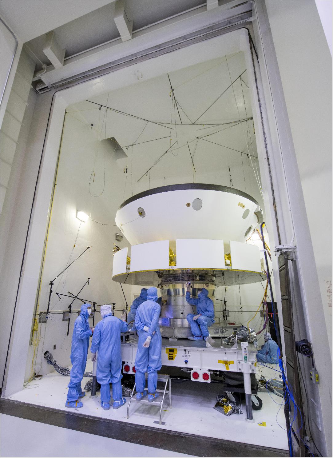 Figure 13: Engineers and technicians working on NASA's Mars 2020 mission prepare spacecraft components for acoustic testing in the Environmental Test Facility at NASA's Jet Propulsion Laboratory in Pasadena, California. The spacecraft is being tested in the same configuration it will be in when sitting atop the Atlas rocket that will launch the latest rover towards Mars in July 2020. The image was taken on April 11, 2019, at NASA/JPL (image credit: NASA/JPL)