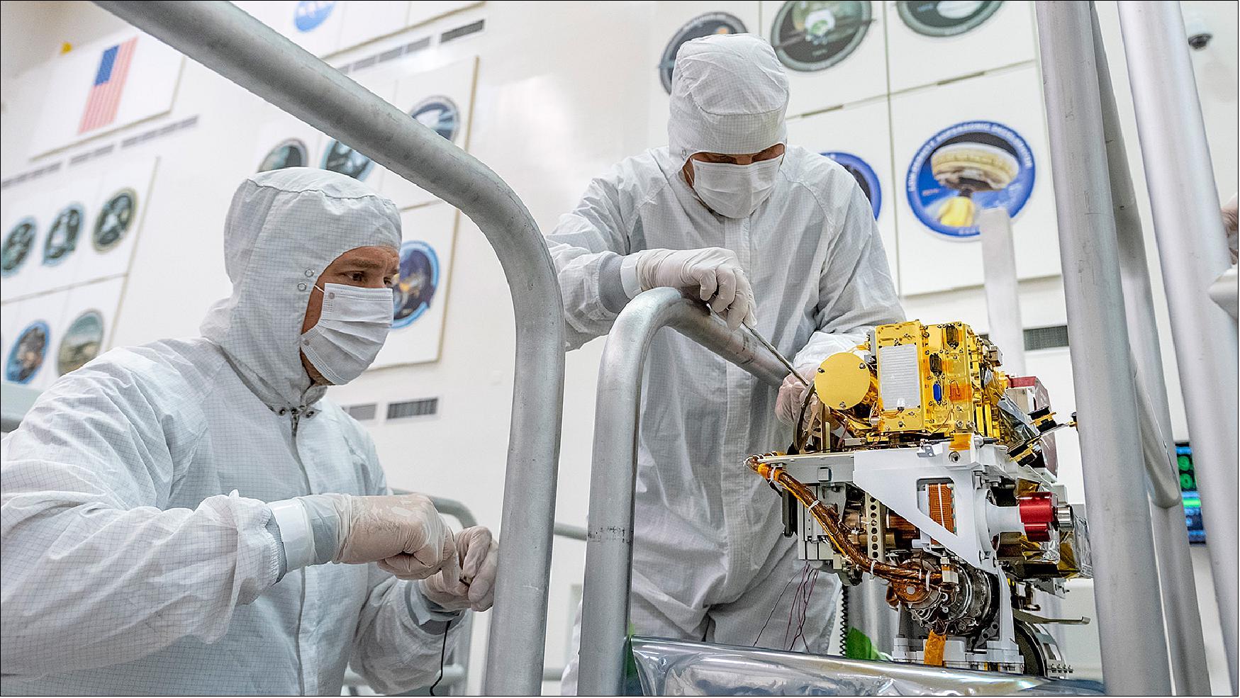 Figure 5: In this image taken June 25, 2019, engineers install the SuperCam instrument on Mars 2020's rover. This image was taken in the Spacecraft Assembly Facility at NASA's Jet Propulsion Laboratory, Pasadena, California (image credit: NASA/JPL-Caltech)