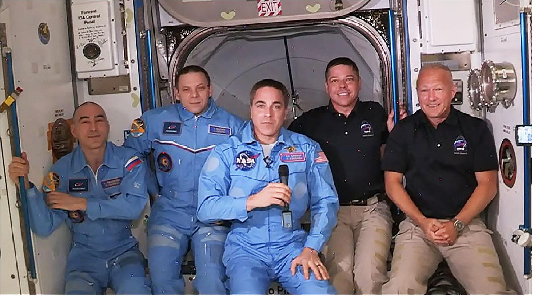 Figure 17: Behnken and Hurley, (at the right) the first astronauts to fly to SpaceX’s Crew Dragon to the station, were welcomed as crew members of Expedition 63 by fellow NASA astronaut Chris Cassidy and two Russian cosmonauts Anatoly Ivanishin and Ivan Vagner. “The whole world saw this mission, and we are so, so proud of everything you’ve done for our country and, in fact, to inspire the world," NASA Administrator Jim Bridenstine told the crew from the floor of Mission Control in Houston. “This represents a transition in how we do spaceflight from the United States of America. NASA is not going to purchase, own and operate rockets and capsules the way we used to; we’re going to partner with commercial industry (image credit: NASA, Bill Stafford)
