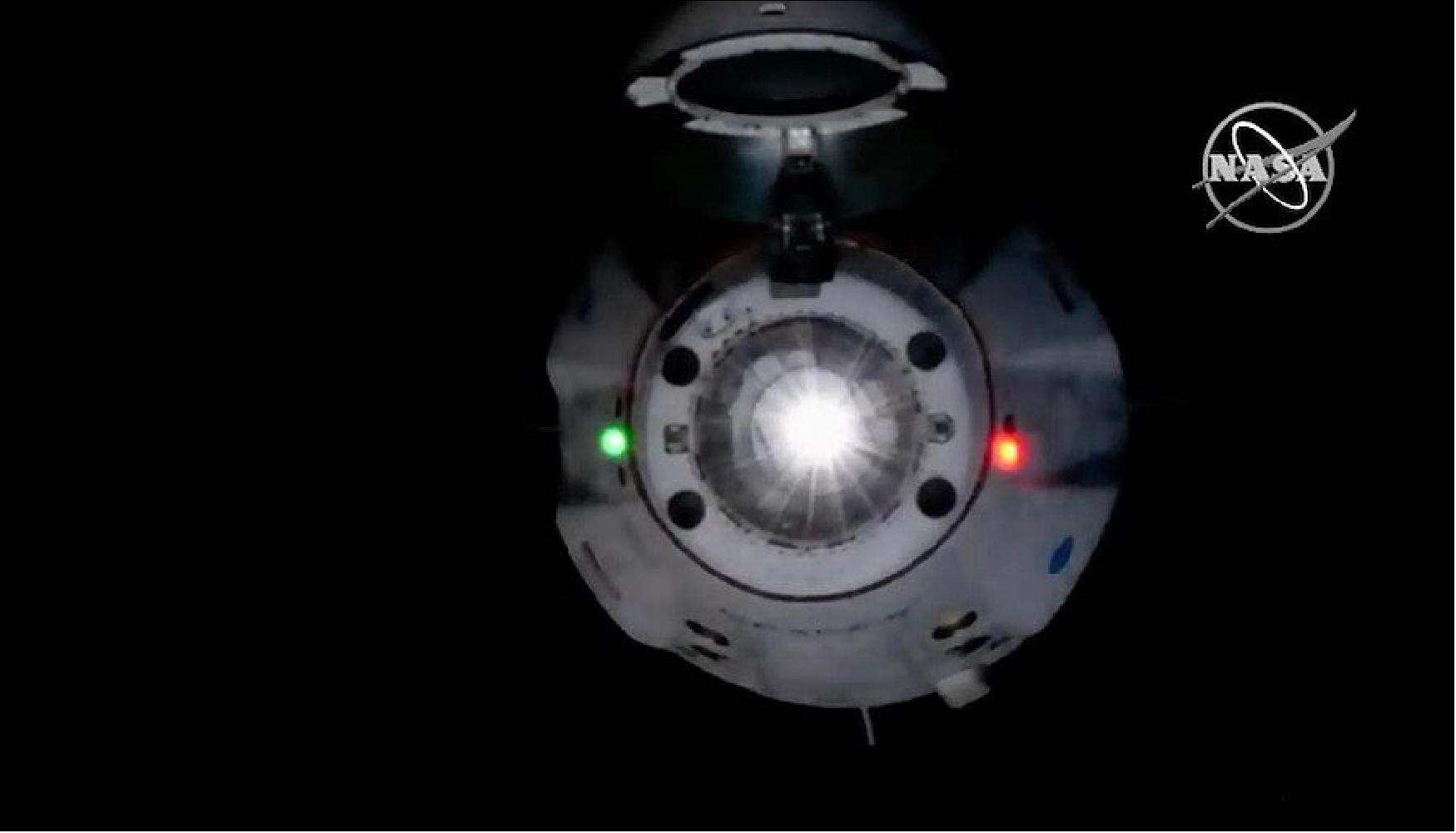 Figure 35: SpaceX’s Crew Dragon spacecraft closes in for docking Sunday at the International Space Station (image credit: NASA TV/Spaceflight Now)