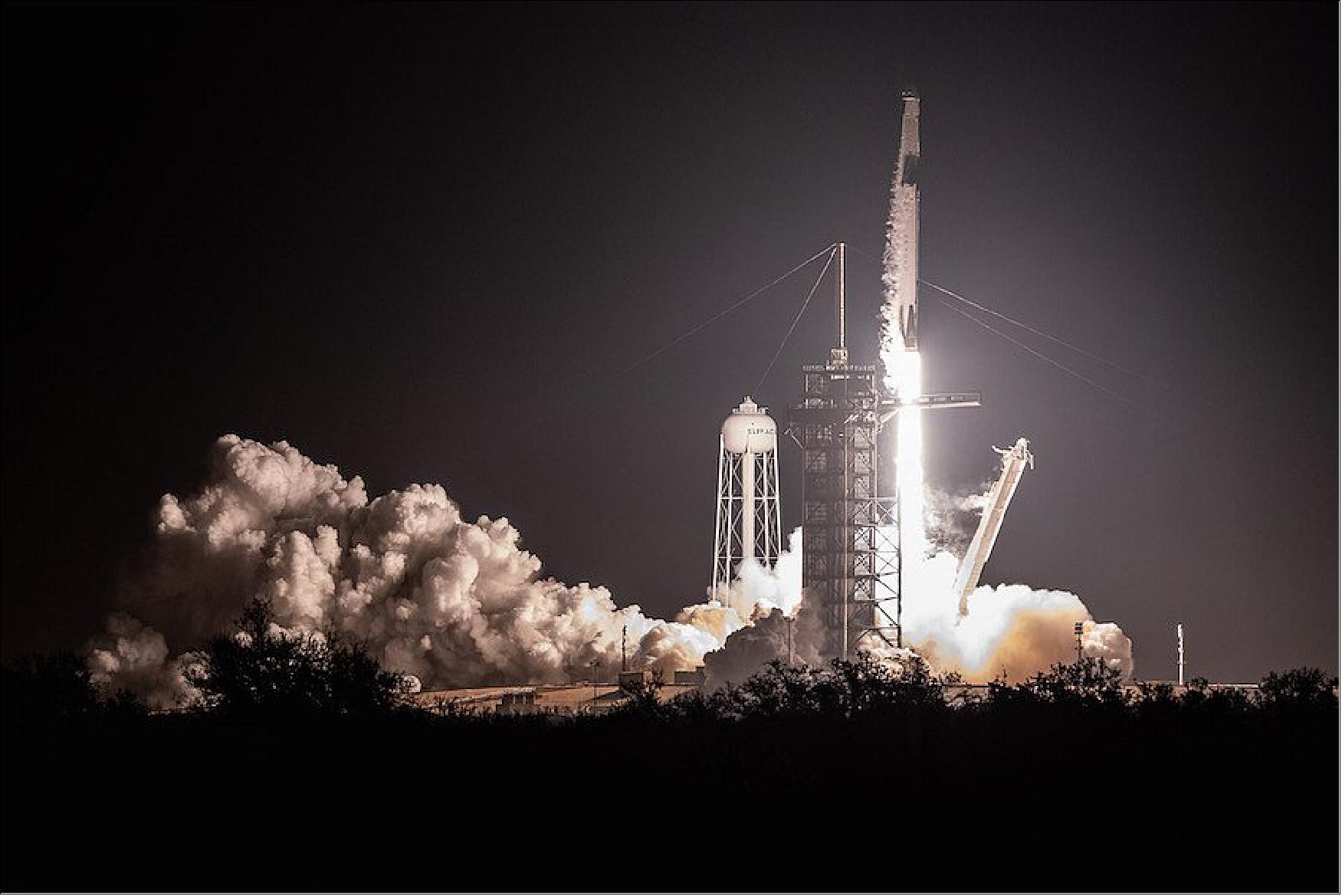 Figure 34: SpaceX’s Falcon 9 rocket fires away from pad 39A at NASA’s Kennedy Space Center with the first space-bound Crew Dragon capsule (image credit: Walter Scriptunas II / Spaceflight Now)
