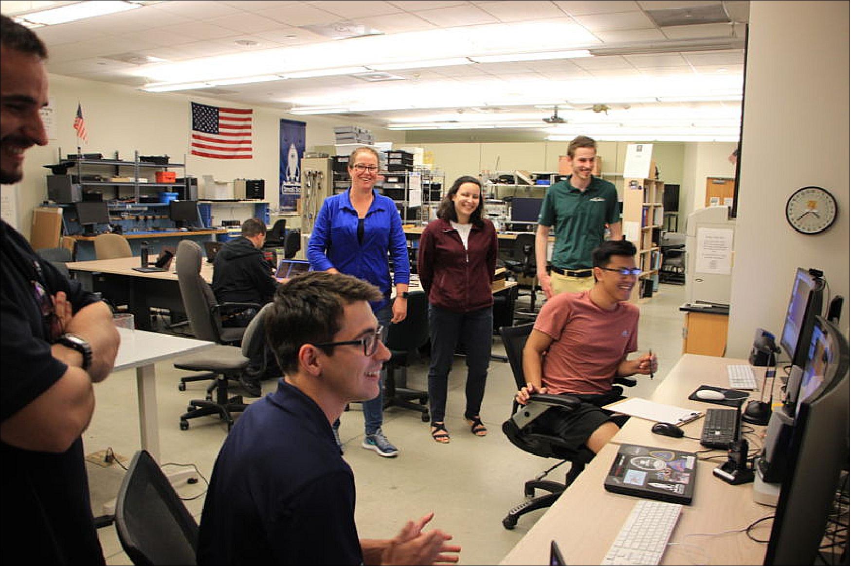 Figure 19: LightSail-2 team members watch as the first signals from the spacecraft are received at Cal Poly San Luis Obispo in California on 2 July 2019 (image credit: Bruce Betts / The Planetary Society)