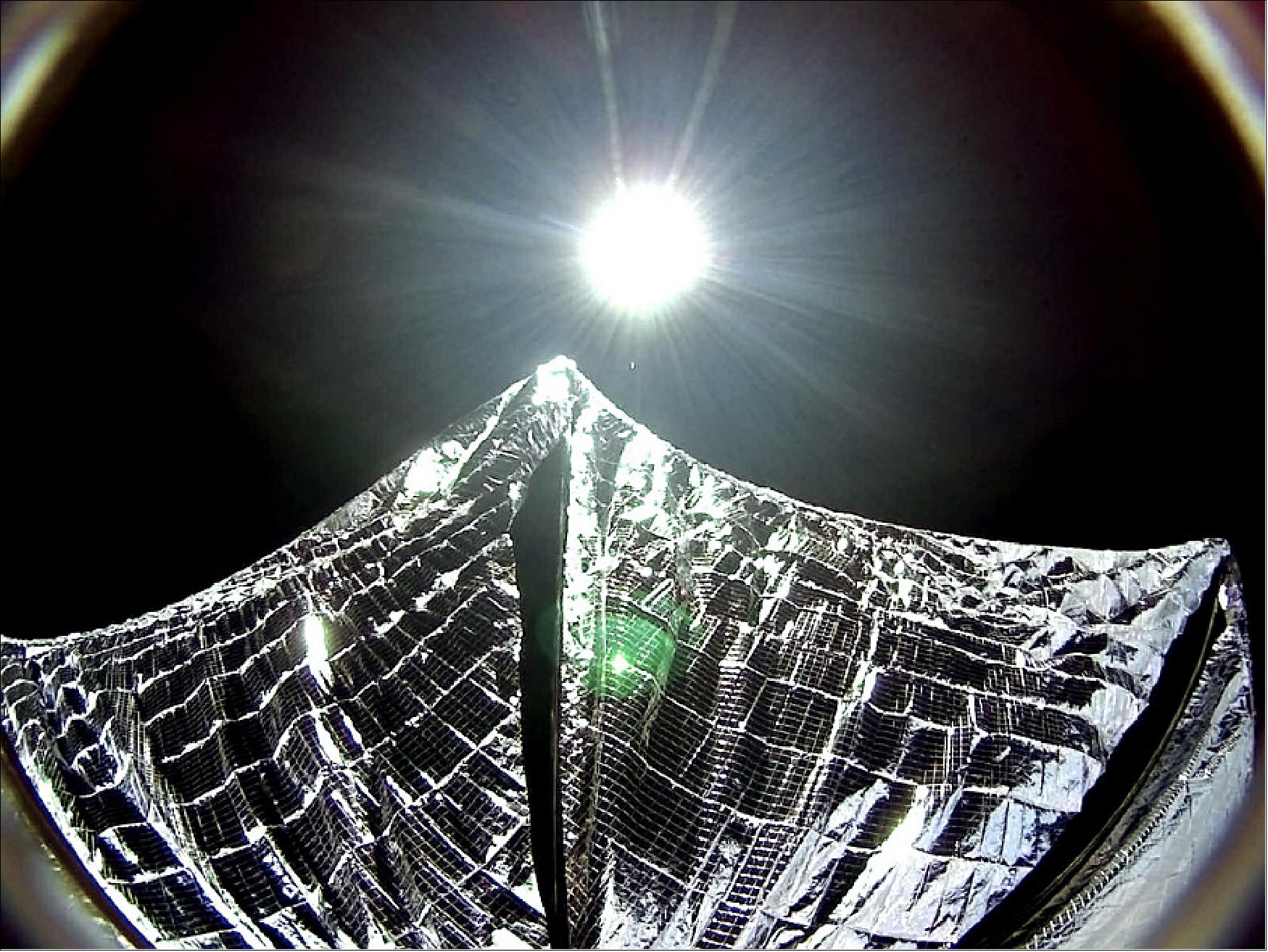 Figure 2: This image was captured by a camera aboard LightSail 1 on June 8, 2015, shortly after solar sail deployment. It was color-corrected by Dan Slater to remove the camera's artificial purplish tint based on ground test images, and is a closer approximation to what the human eye would see (image credit: The Planetary Society)