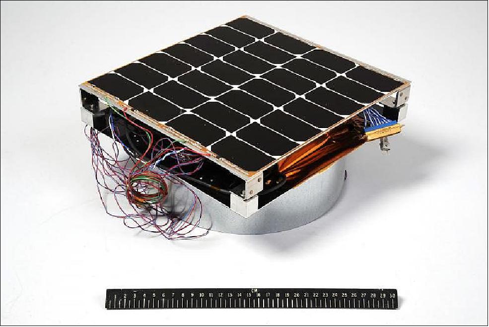 Figure 12: Image of FRAM with a 12-inch ruler for scale. The hardware is the first orbital experiment designed to convert sunlight for microwave power transmission for solar power satellites (image credit: U.S. Naval Research Laboratory)