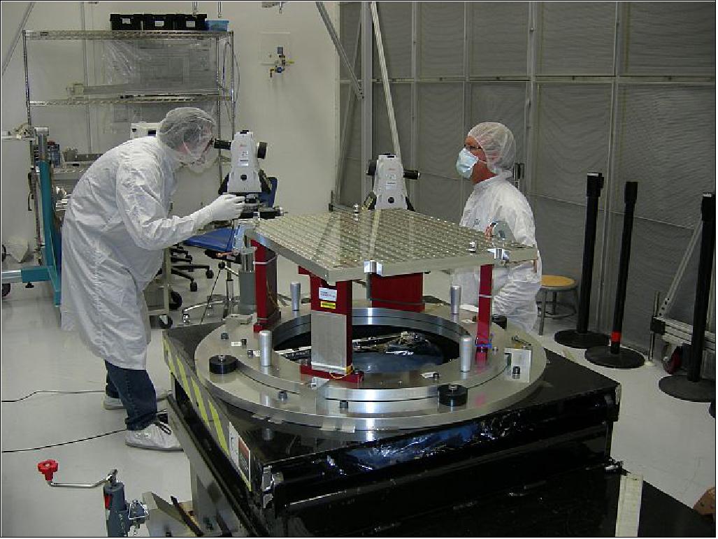 Figure 2: Ball Aerospace technicians use specialized equipment to build the GPIM satellite so that the space vehicle instruments and thrusters align perfectly with the payload interface (image credit: BATC)