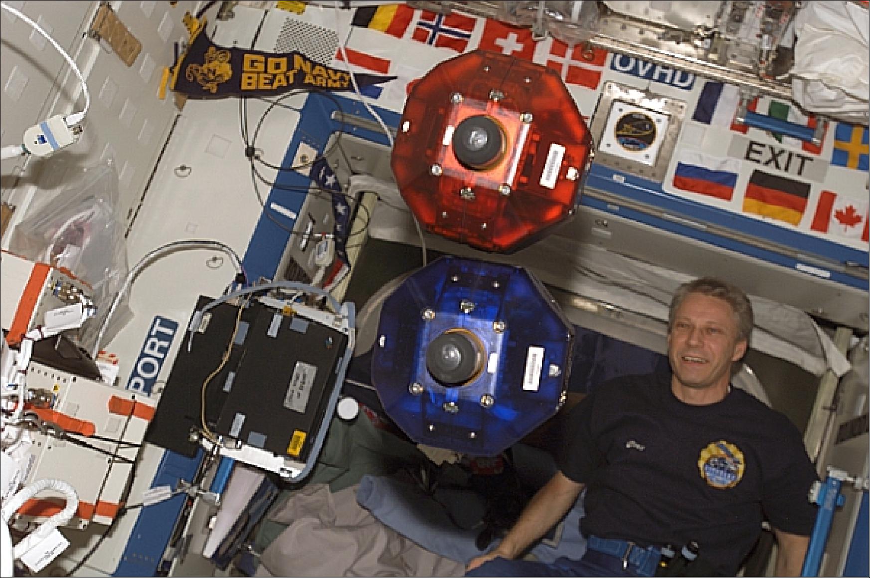 Figure 12: SPHERES experiment of two units in the ISS module Destiny as seen by astronaut Thomas Reiter (image credit: NASA)