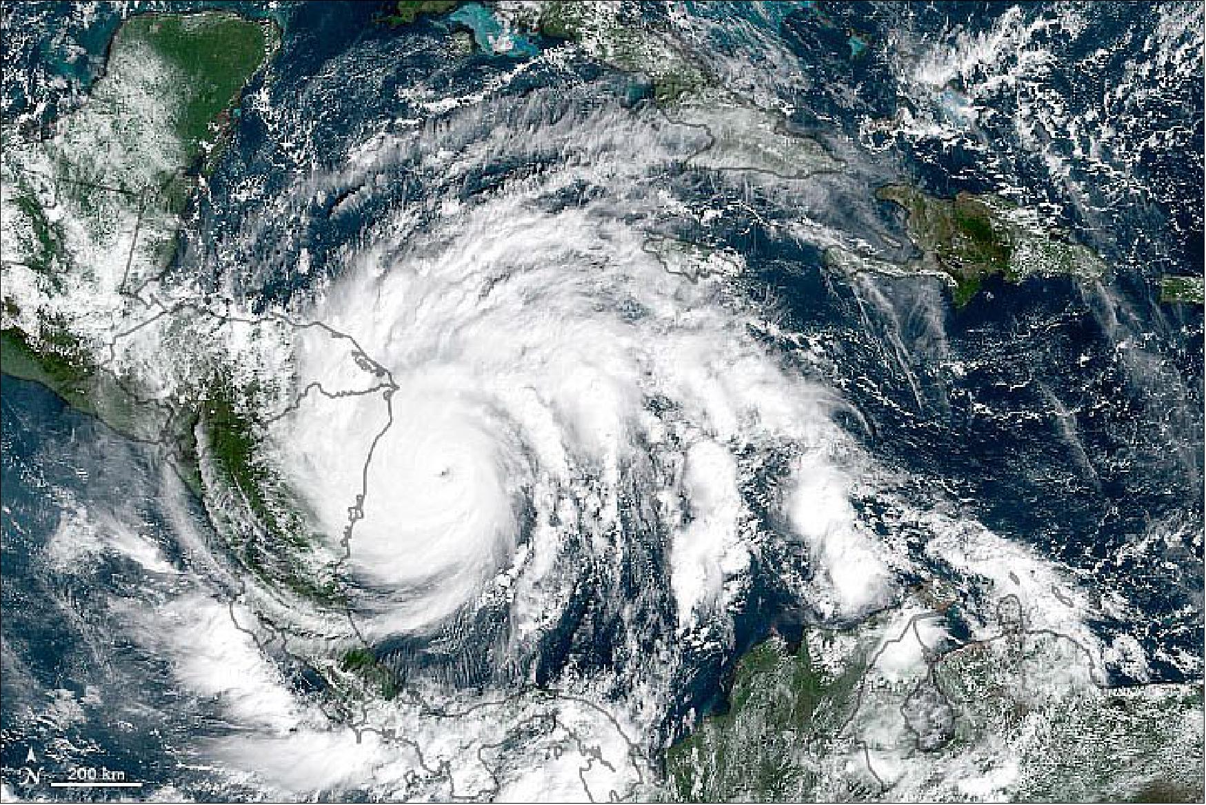 Figure 5: The natural-color image above was acquired at 10 a.m. local time (15:00 Universal Time) on November 16 by ABI (Advanced Baseline Imager) on GOES-16. The satellite is operated by the National Oceanic and Atmospheric Administration (NOAA), which includes the National Hurricane Center. NASA helps develop and launch the GOES series of satellites (image credit: NASA Earth Observatory images by Joshua Stevens, using GOES-16 imagery courtesy of NOAA and the National Environmental Satellite, Data, and Information Service (NESDIS), data from the Multiscale Ultrahigh Resolution (MUR) project, and Black Marble data from NASA/GSFC. Story by Michael Carlowicz, with scientific interpretation from Timothy Hall, NASA Goddard Institute for Space Studies)