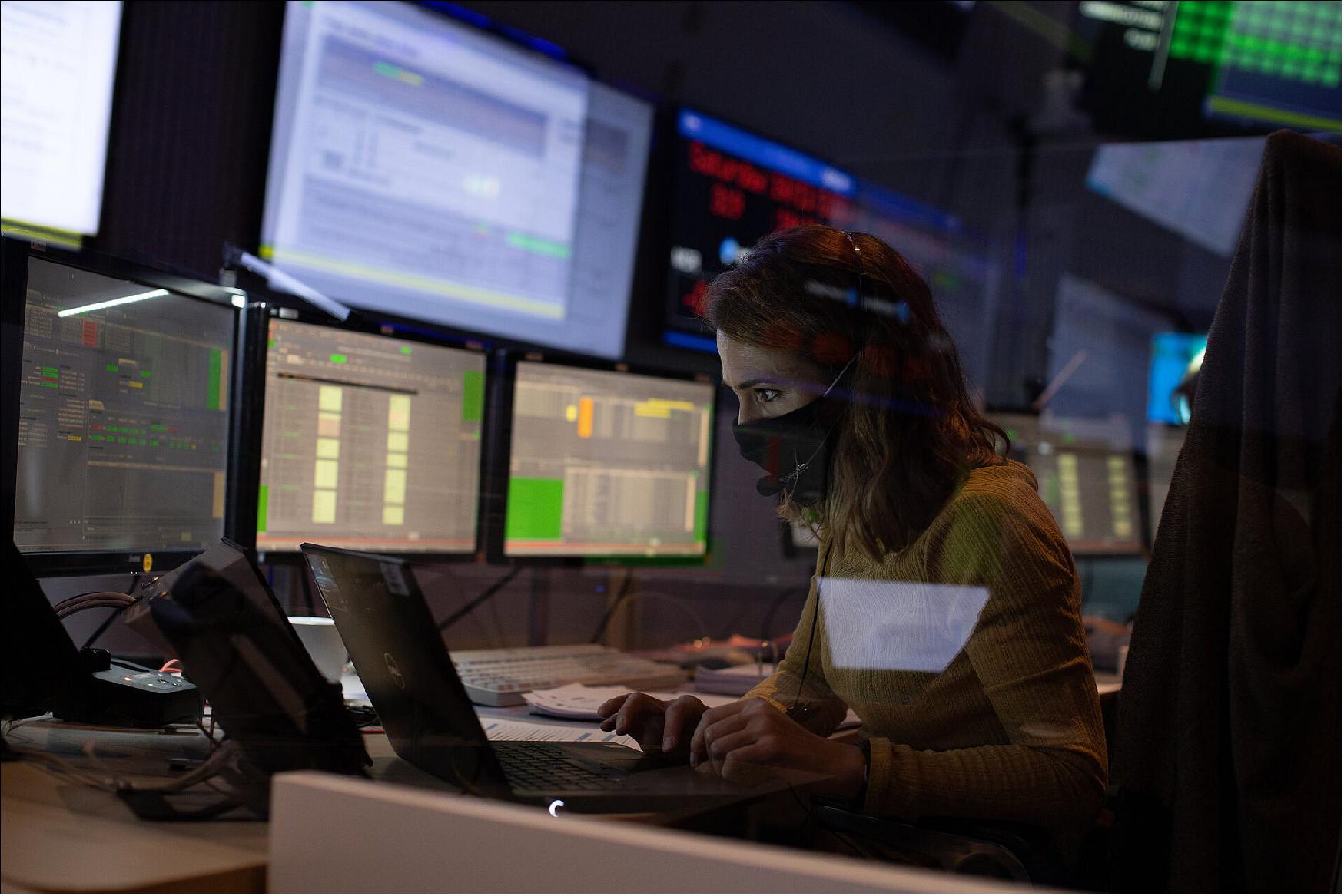 Figure 7: In this photo, Isabel Rojo, Spacecraft Operations Manager for the mission sits in the Main Control Room at ESA's European Space Operations Centre during the rehearsal. Masks, dividers and strict social distancing rules are now in place across the site (image credit: ESA / Daniel Mesples)
