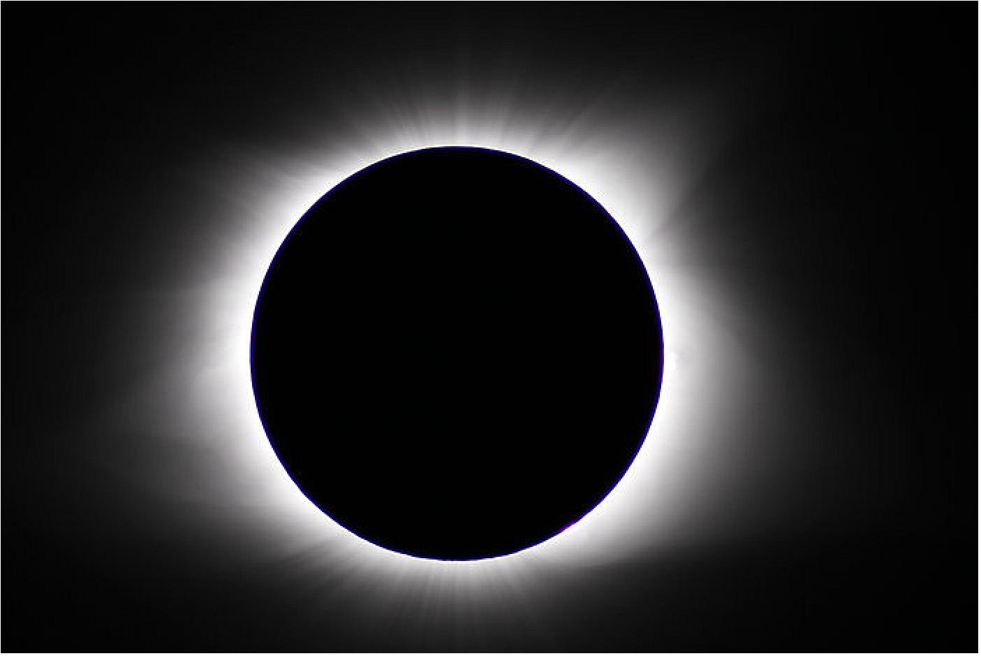 Figure 27: The total solar eclipse seen from Casper, Wyoming (US), by a team of ESA astronomers, as part of the CESAR (Cooperation through Education in Science and Astronomy Research) educational initiative. The image shows the moment of totality, when the Moon passed directly in front of the Sun, blocking its light and revealing the details of the Sun's atmosphere, its corona (image credit: ESA / M. P. Ayucar, CC BY-SA 3.0 IGO)