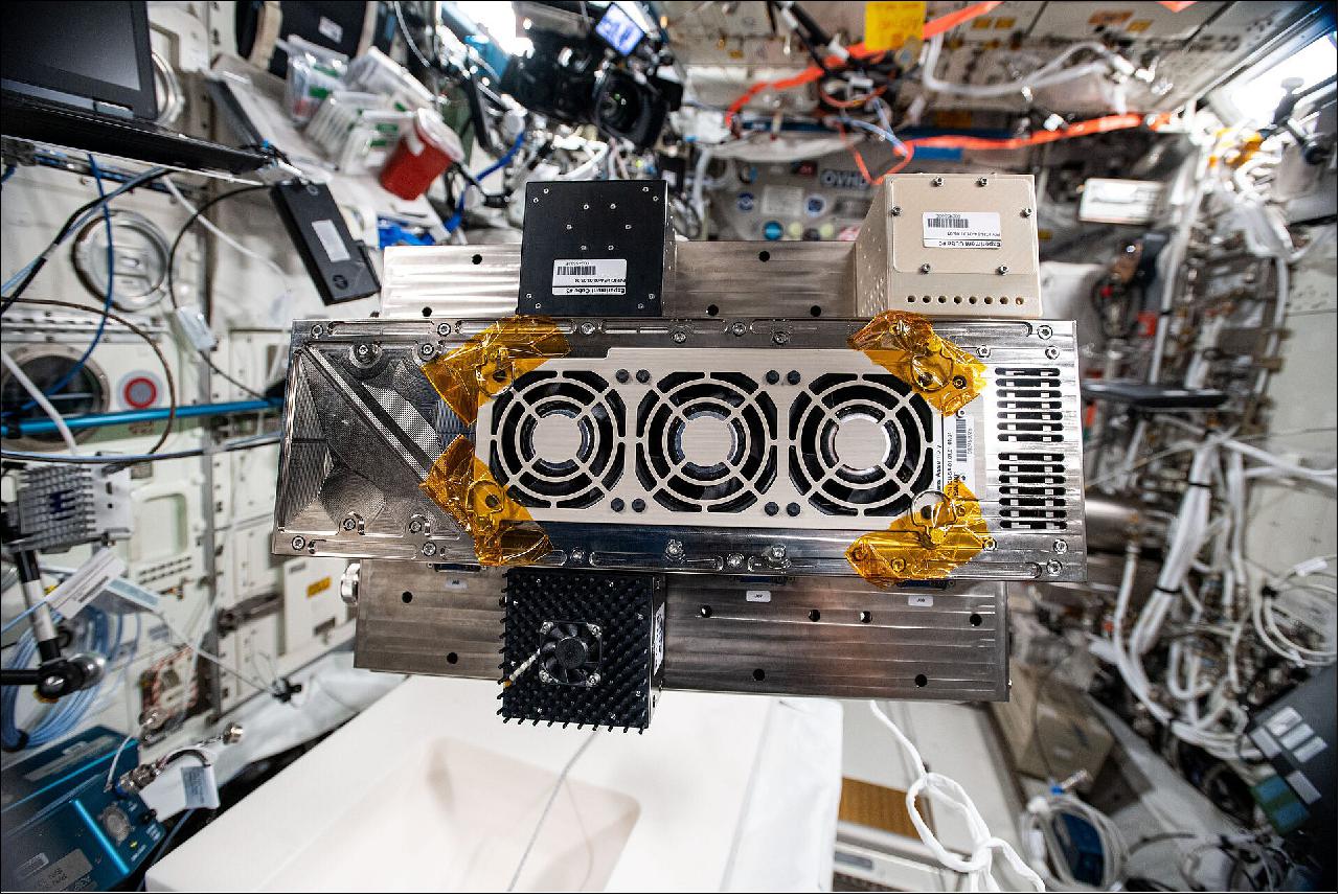 Figure 11: ICE Cube facility modules. The ICE Cubes facility floating in Europe's Columbus module that is part of the International Space Station before Japanese astronaut Soichi Noguchi slots the facility into place, December 2020. At the time this picture taken the cubes included experiments on COVID-19 drug research, an art project from the International Space University, a test of how standard consumer equipment handles the radiation found in space, and an ESA test of cyber-security in space (image credit: ESA/NASA/JAXA)