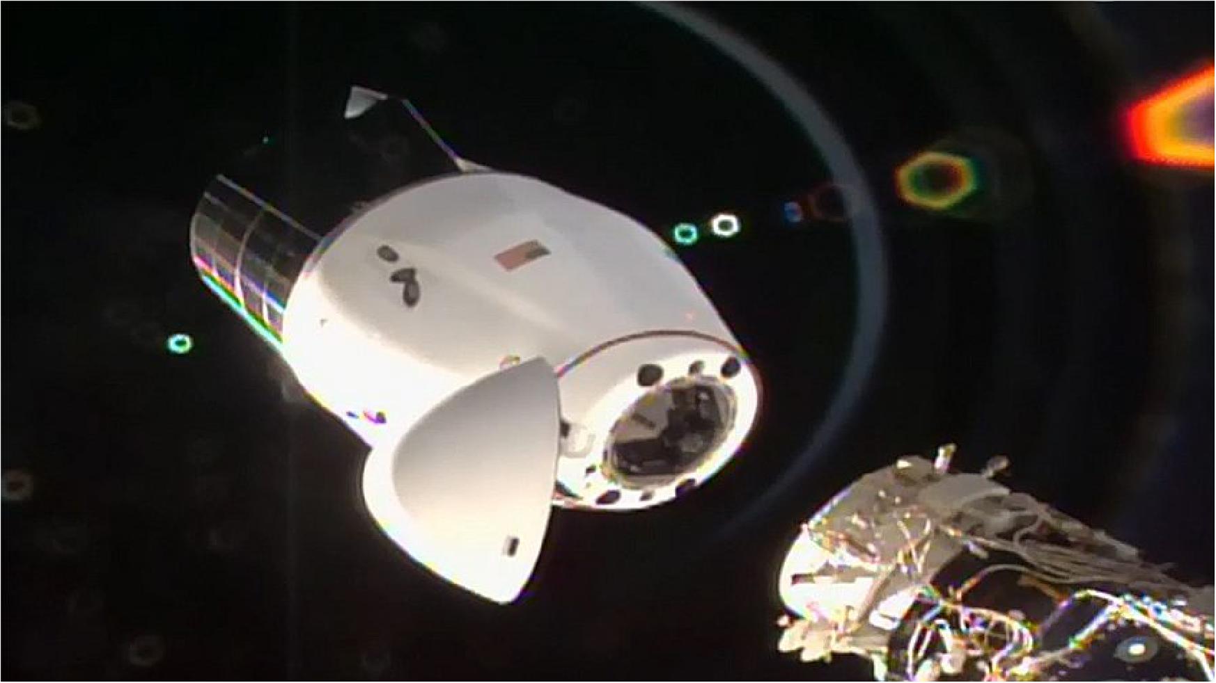 Figure 10: The SpaceX Cargo Dragon vehicle begins its separation from the station after undocking from the Harmony module’s international docking adapter (image credit: NASA TV)