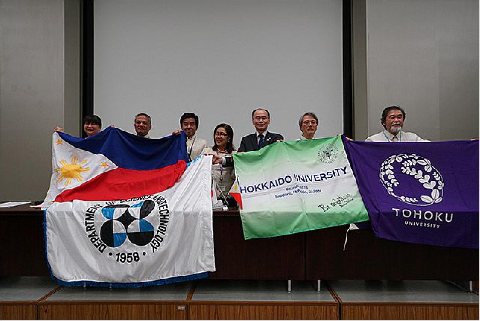 Figure 15: Commemorative photo of the microsatellite development parties [DOST (Department of Science and Technology) of the University of the Philippines, Hokkaido University and Tohoku University] at the JAXA press conference after the DIWATA-1 deployment (image credit: JAXA)