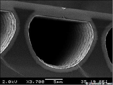 Figure 8: SEM photo of a fabricated surface channel with a diameter of ~20 µm and a silicon nitride wall thickness of 1 µm (image credit: PRECISE consortium)