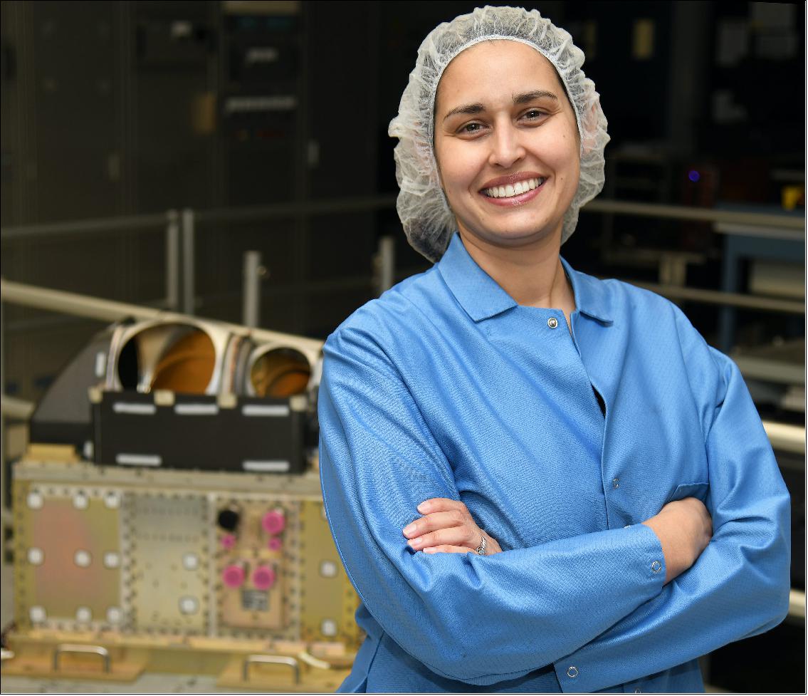Figure 9: Danielle Gallegos, ATMS program manager for Northrop Grumman, with the ATMS instrument behind her (image credit: Northrop Grumman)