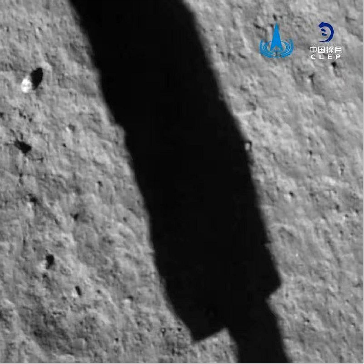 Figure 20: This view of the moon's surface was taken by the landing camera of Chang'e-5 shortly after its Dec. 1, 2020 touchdown in the Ocean of Storms. A shadow from one of the lander's legs is visible on the lunar surface (image credit: China National Space Administration/CLEP)