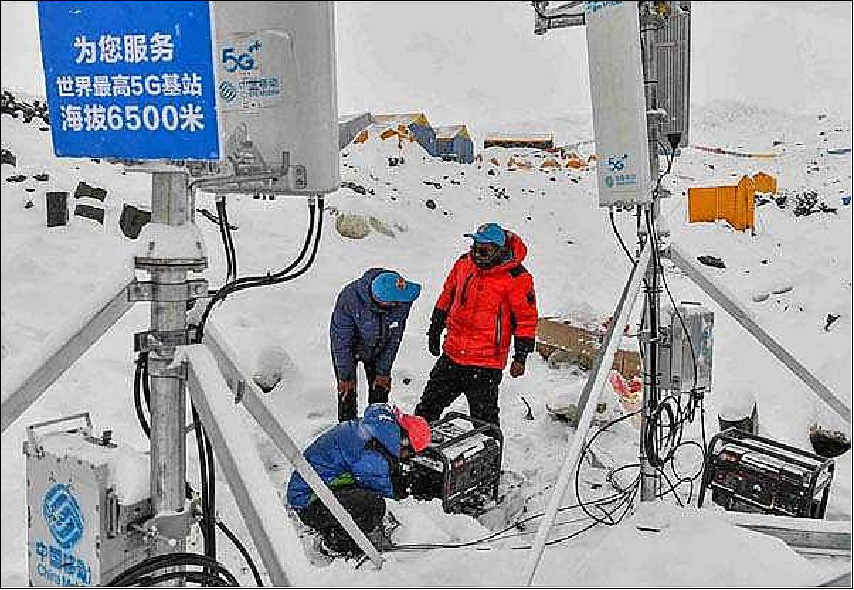 Figure 7: Workers set up a China Mobile 5G base station integrated with the BeiDou system at a camp 6,500 meters above the sea level en route to the peak of Mount Qomolangma-also known as Mount Everest-in May last year (image credit: Jigme Dorji, Xinhua)