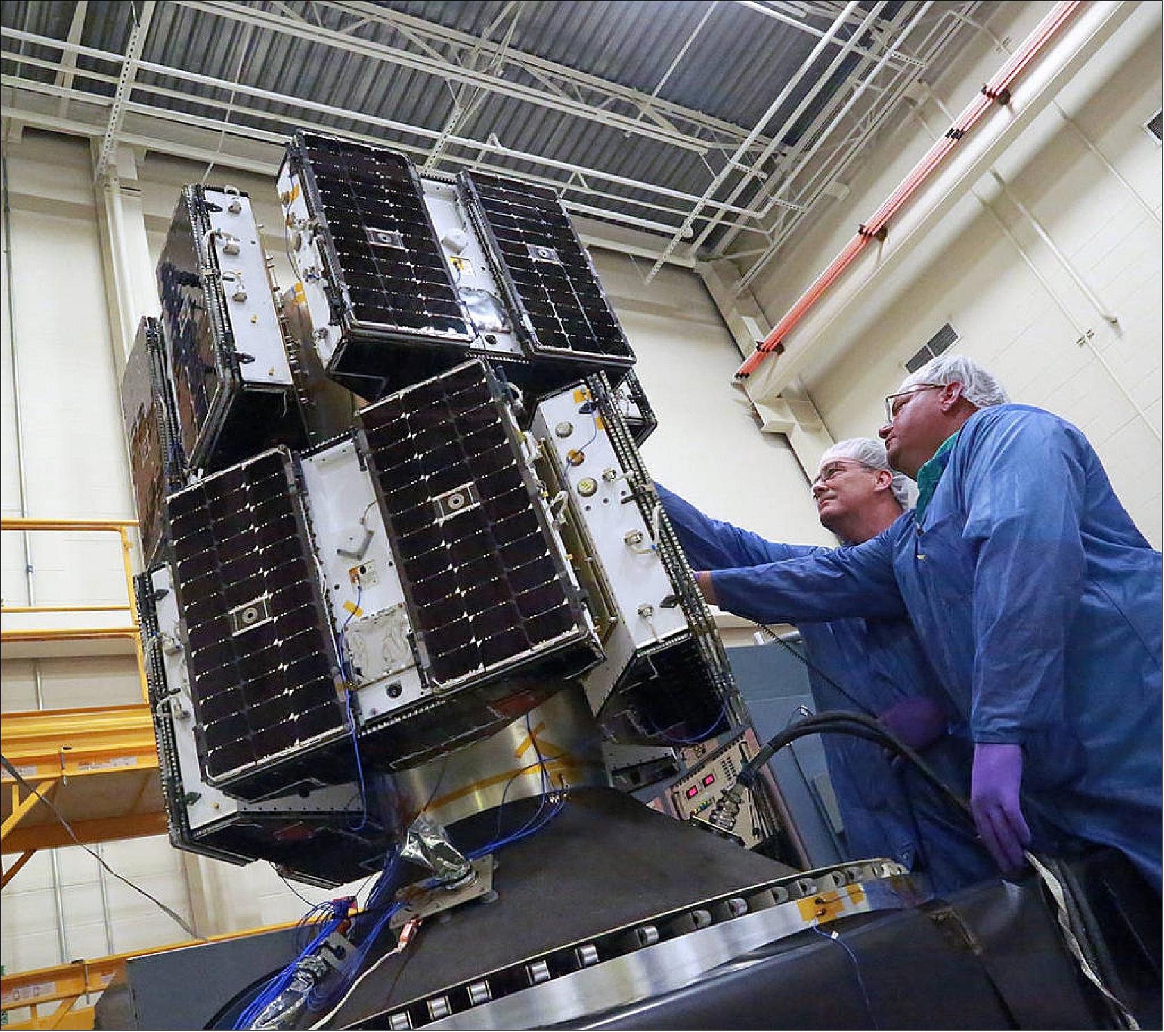 Figure 11: Engineers prepare the CYGNSS microsatellites, mounted on the deployment module, for vibration testing at the Southwest Research Institute in San Antonio, Texas (image credit: SwRI)