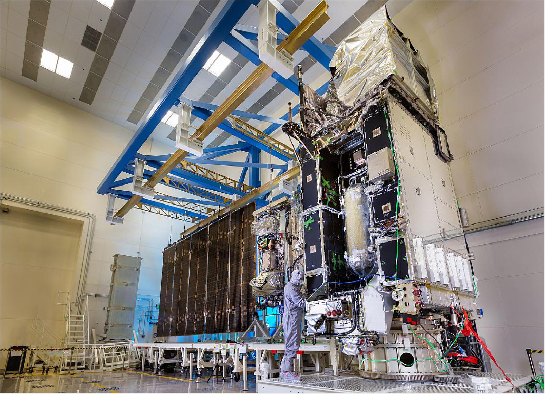 Figure 44: Lockheed Martin engineers and technicians test the deployment of the large GOES-R satellite solar array before the spacecraft undergoes environmental testing (image credit: Lockheed Martin)