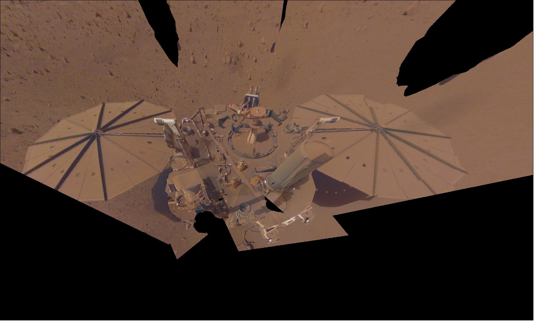 Figure 18: NASA’s InSight Mars lander took this final selfie on April 24, 2022, the 1,211th Martian day, or sol, of the mission. The lander is covered with far more dust than it was in its first selfie, taken in December 2018, not long after landing - or in its second selfie, composed of images taken in March and April 2019 (image credit: NASA/JPL-Caltech)
