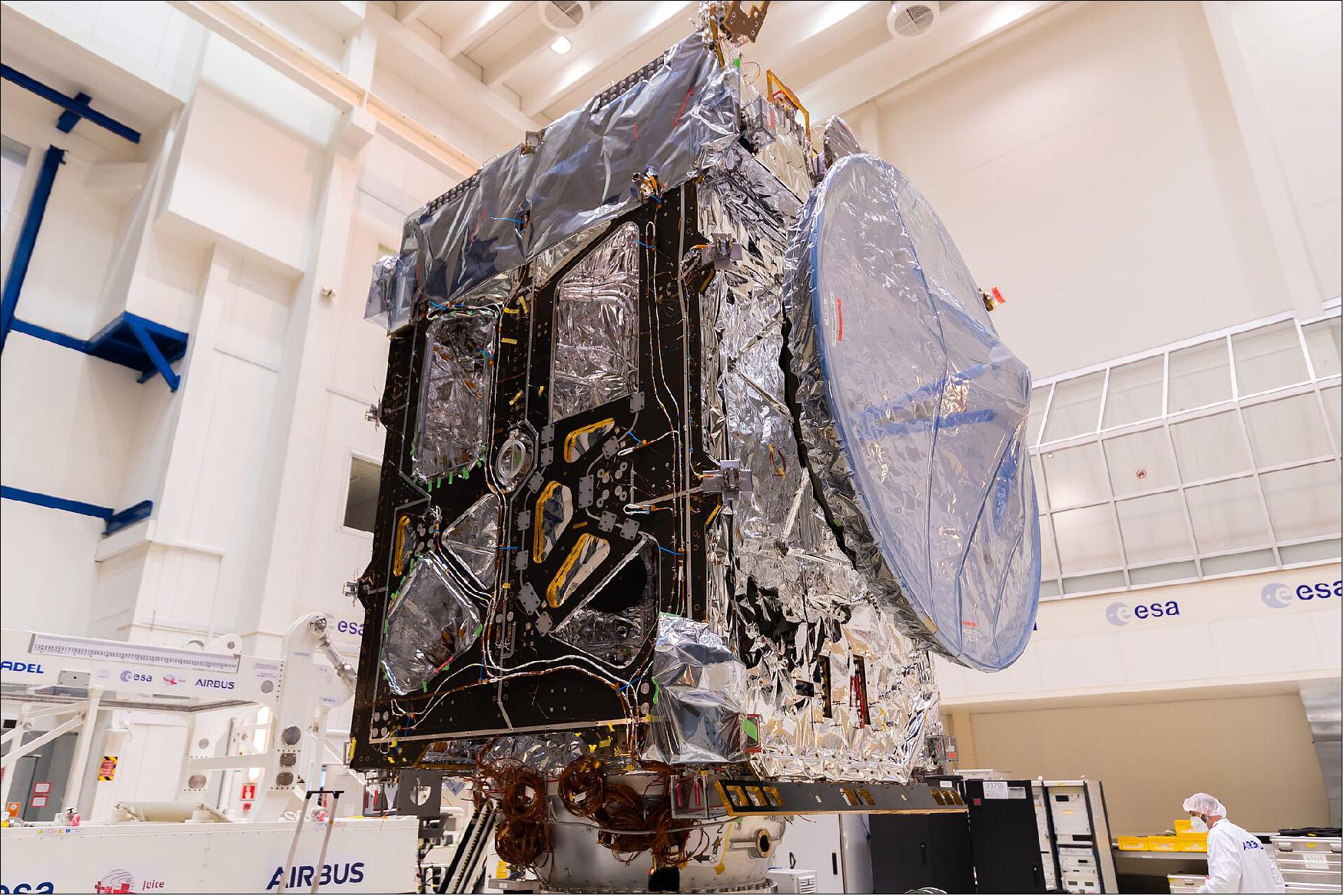 ESA's JUICE satellite being installed on a ‘multi-purpose trolley' in the Rosetta clean room at ESTEC in the Netherlands on 30 April. The multi-purpose trolley allows the spacecraft to be rotated and titled, providing better access to the engineers for integration operations and preparation for testing, and in general to facilitate the work on the different sides of the spacecraft. The trolley is made of non-magnetic material, to comply to the strict magnetic cleanliness requirements of the spacecraft (image credit: ESA-SJM Photography)