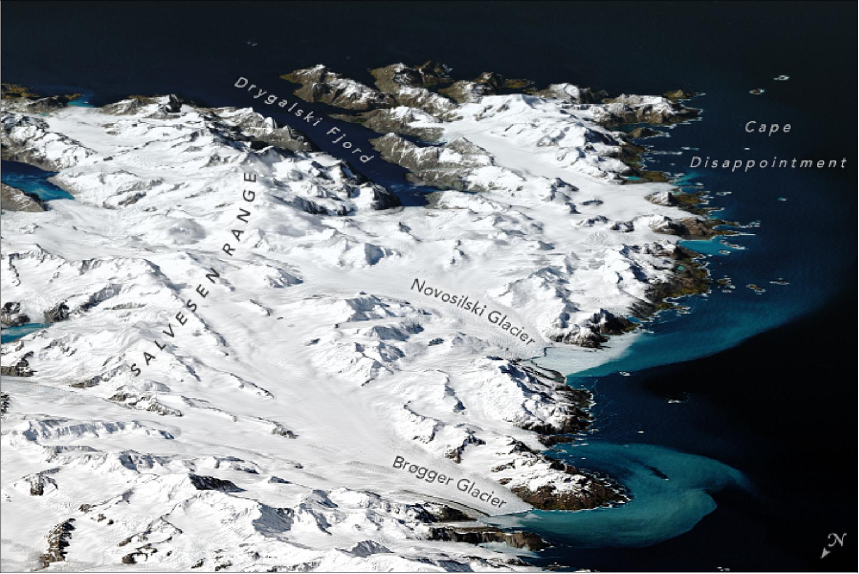 Figure 102: This image gives a sense of the topography by overlaying the Landsat-8 data of 25 December 2018 on a digital elevation model from the Shuttle Radar Topography Mission (SRTM). The Novosilski and Brøgger Glacier are approximately 13 km and 11 km long, respectively (image credit: NASA Earth Observatory images by Joshua Stevens, using Landsat data from the U.S. Geological Survey; story by Kasha Patel)