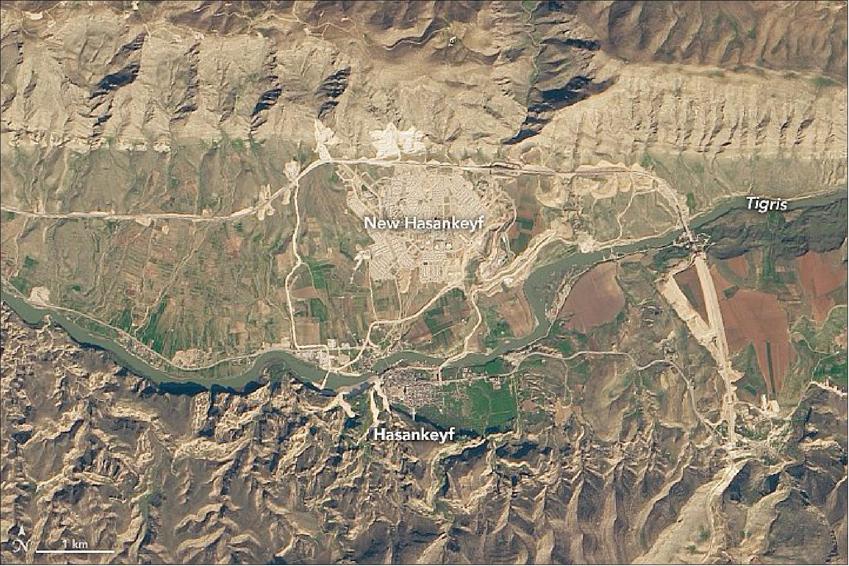 Figure 109: The 12,000-year old town of Hasankeyf could soon be underwater due to the construction of a new dam. This natural-color image of OLI on Landsat-8 shows Hasankeyf on February 22, 2019. The reservoir began filling in July 2019 (NASA Earth Observatory, images by Lauren Dauphin, using Landsat data from the U.S. Geological Survey)