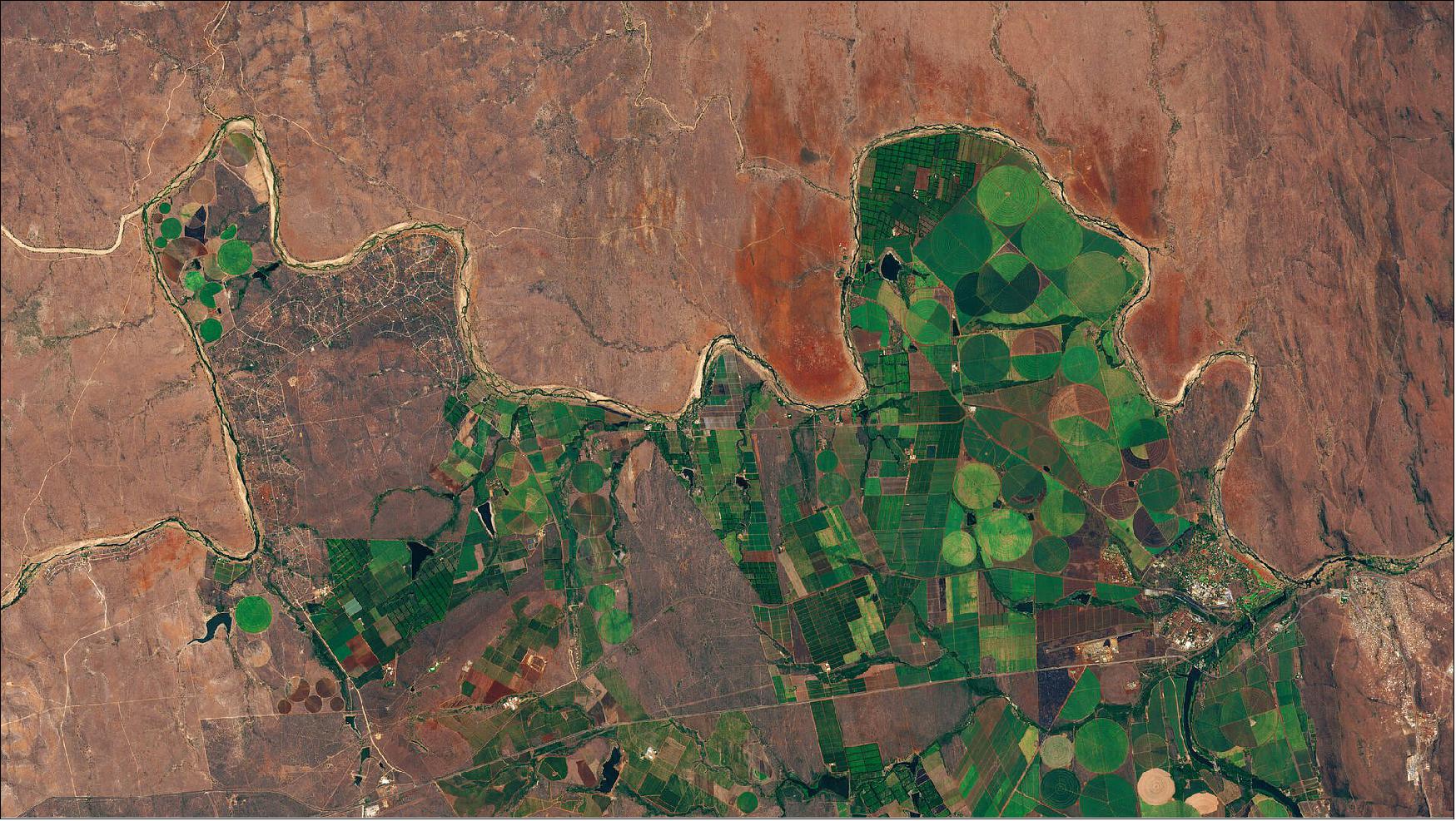 Figure 65: Circular cultivated areas along Crocodile River. Captured by the Copernicus Sentinel-2 mission, this image shows circular cultivated areas in farms next to the Crocodile River in Mpumalanga Province, South Africa. Farmers growing sugar cane and fresh fruit take water from the river to irrigate their crops, leaving less for those people living downstream. In response to severe water shortages, the South African government passed the National Water Act of 1998, which is intended to restrict the amount of water farmers use for irrigation (image credit: ESA, the image contains modified Copernicus Sentinel data (2018), processed by ESA, CC BY-SA 3.0 IGO)