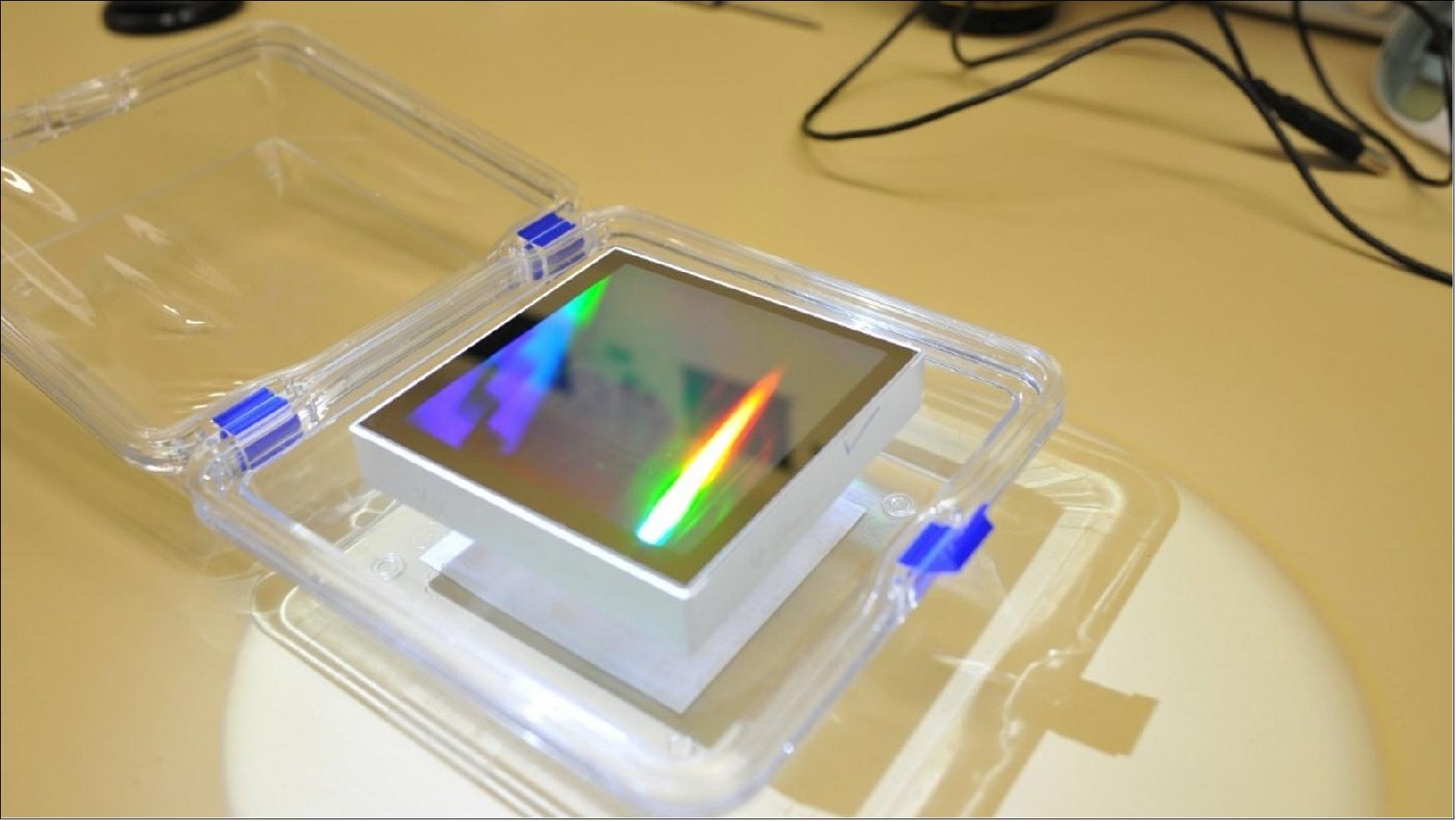 Figure 7: Test grating: Straylight performance verification measurements of a test grating for Sentinel-5P's TROPOMI instrument, carried out in the ESTEC Optics Lab to ensure the delivery of quality measurements of Earth's atmosphere. These gratings are used to split light reflected from the atmosphere so that the spectral fingerprints of trace gases can be pinpointed (image credit: ESTEC Optics Laboratory/ESA)