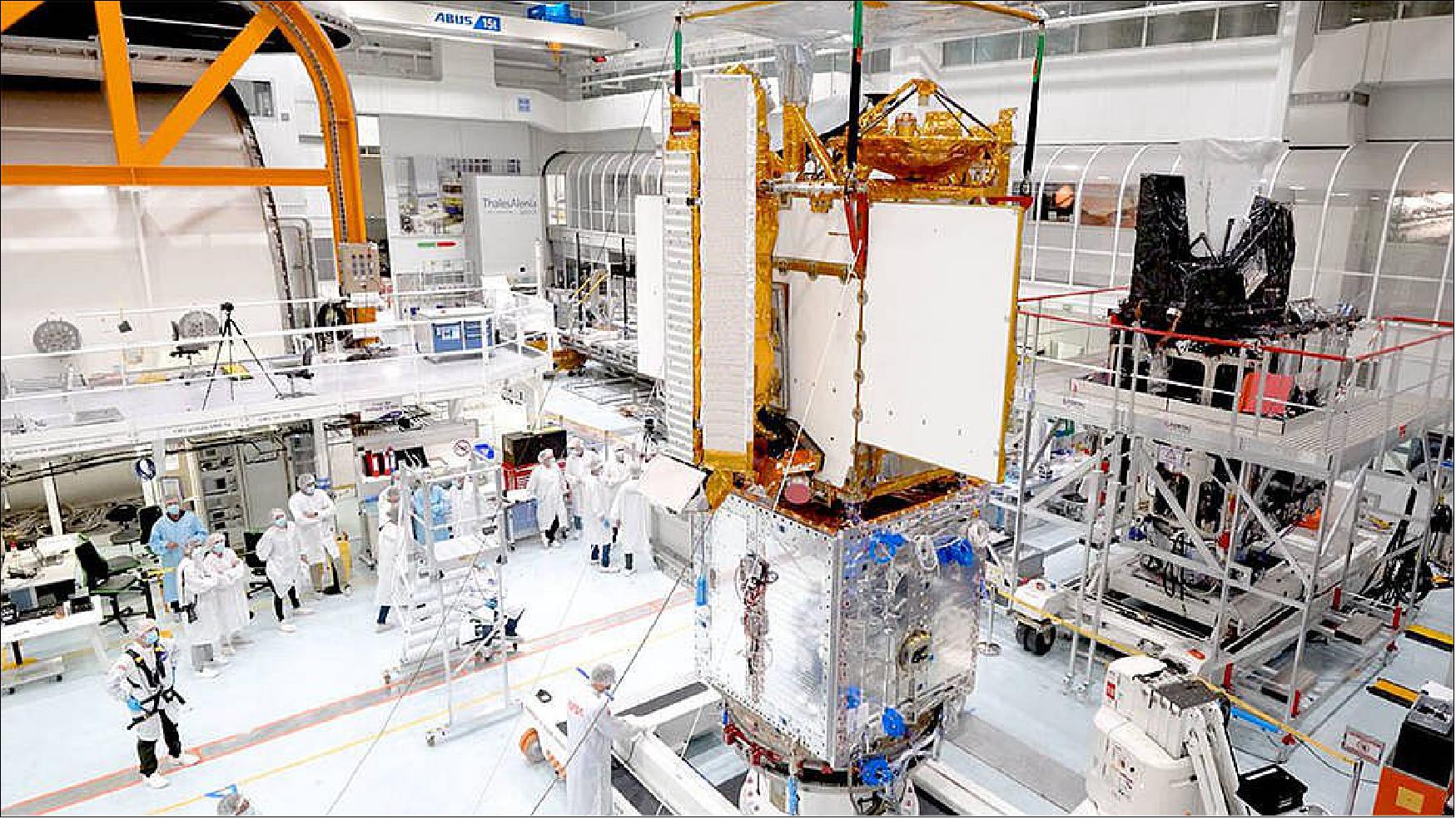 Figure 44: Engineers integrate separate parts of the SWOT satellite into one in a clean room facility in Cannes, France (image credits: Thales Alenia Space)