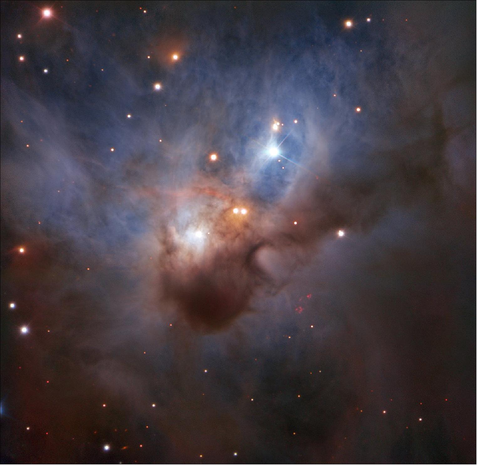 Figure 53: Hidden in one of the darkest corners of the Orion constellation, this Cosmic Bat is spreading its hazy wings through interstellar space two thousand light-years away. It is illuminated by the young stars nestled in its core — despite being shrouded by opaque clouds of dust, their bright rays still illuminate the nebula. Too dim to be discerned by the naked eye, NGC 1788 reveals its soft colors to ESO's Very Large Telescope in this image — the most detailed to date (image credit: ESO)
