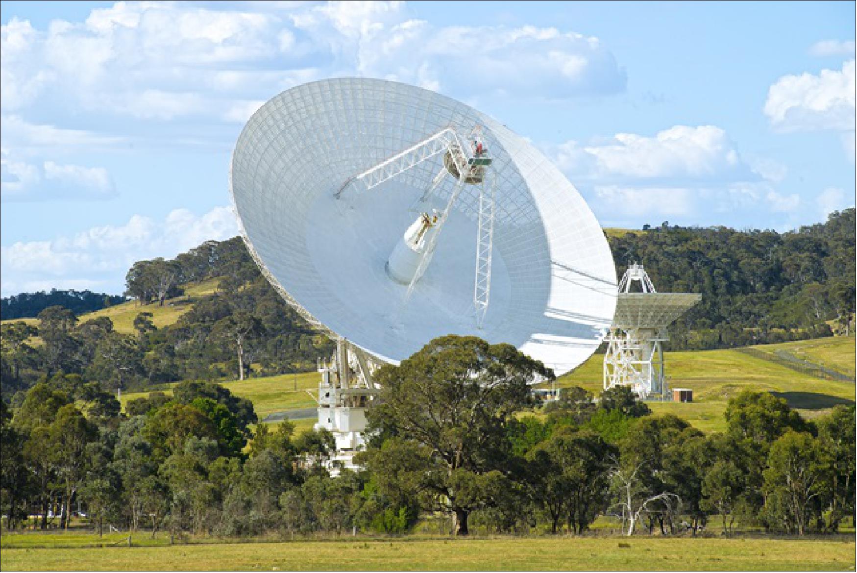 Figure 26: Photo of NASA's CDSCC (Canberra Deep Space Communication Complex), with the 70 m antenna in the foreground, located 35 km outside Australia's capital (image credit: NASA, CSIRO)