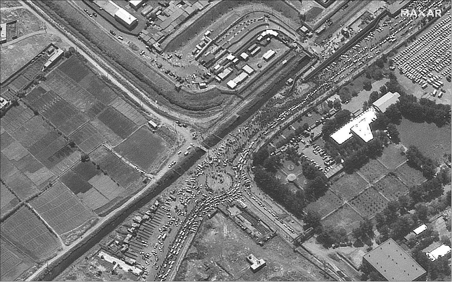 Figure 5: Image capture of the crowds at the northeastern approach to Karzai International Airport (image credit: Maxar Technologies)